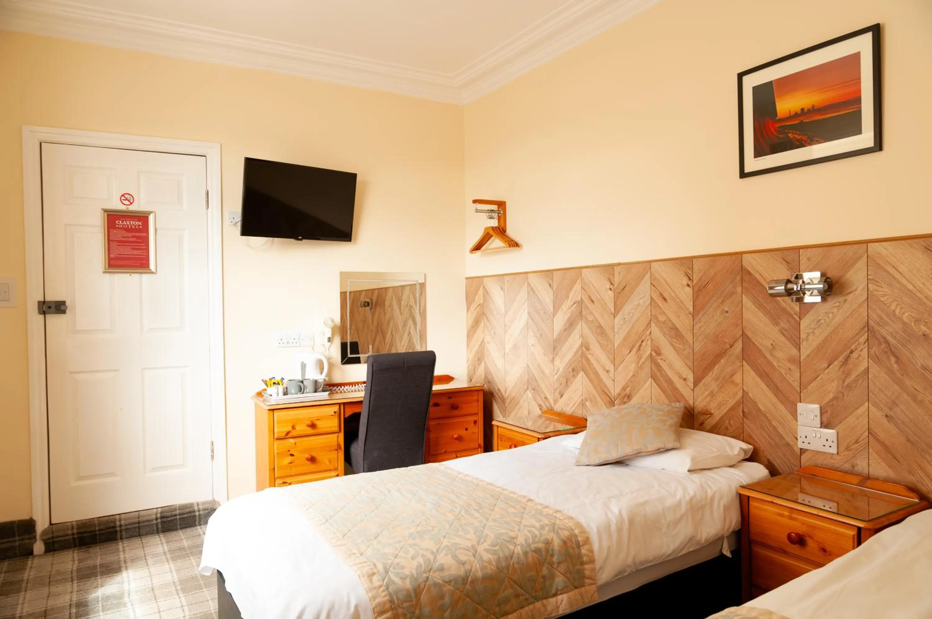 Bed in Claxton Hotel