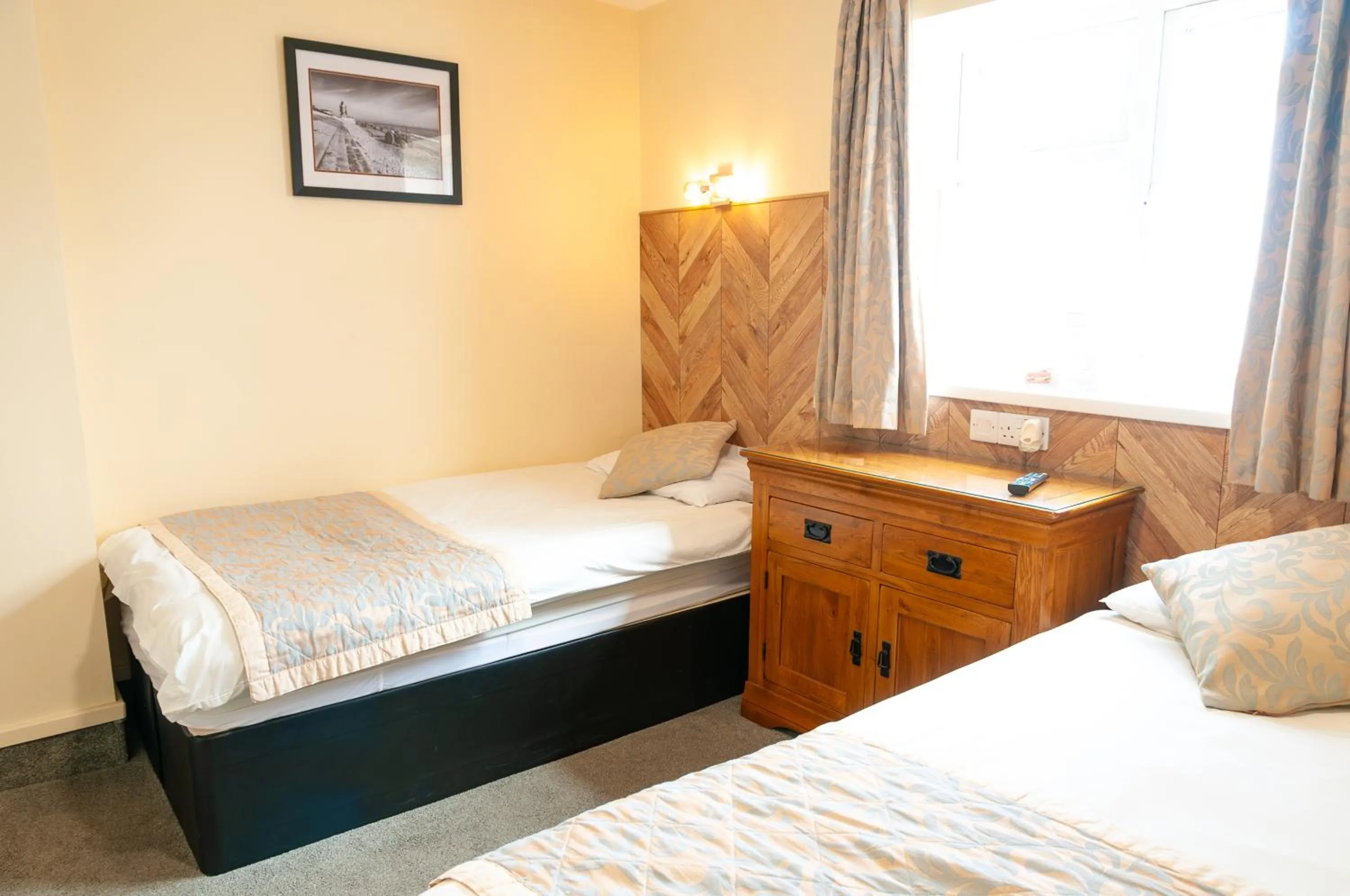 Bed in Claxton Hotel