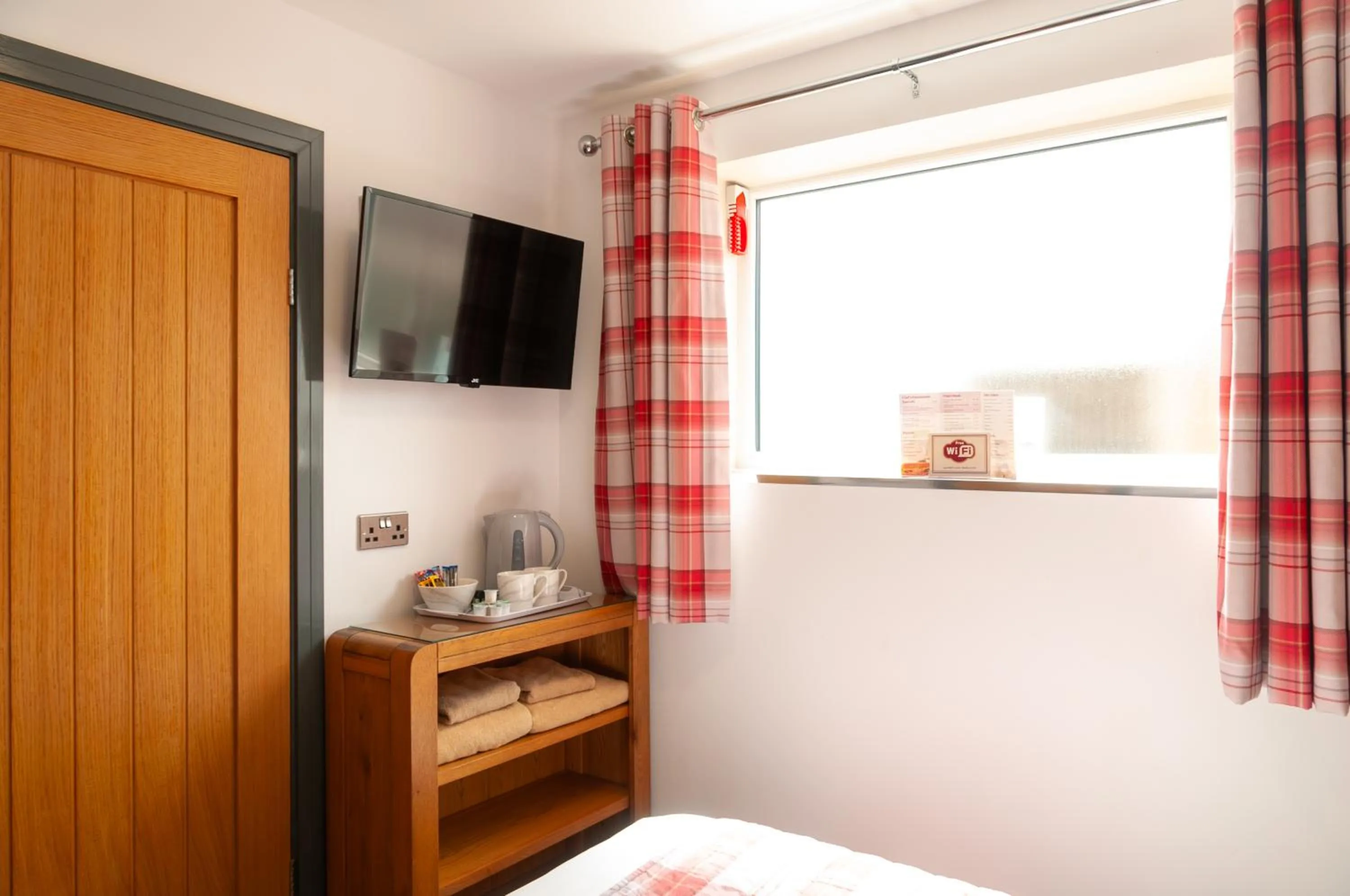 Bed in Claxton Hotel