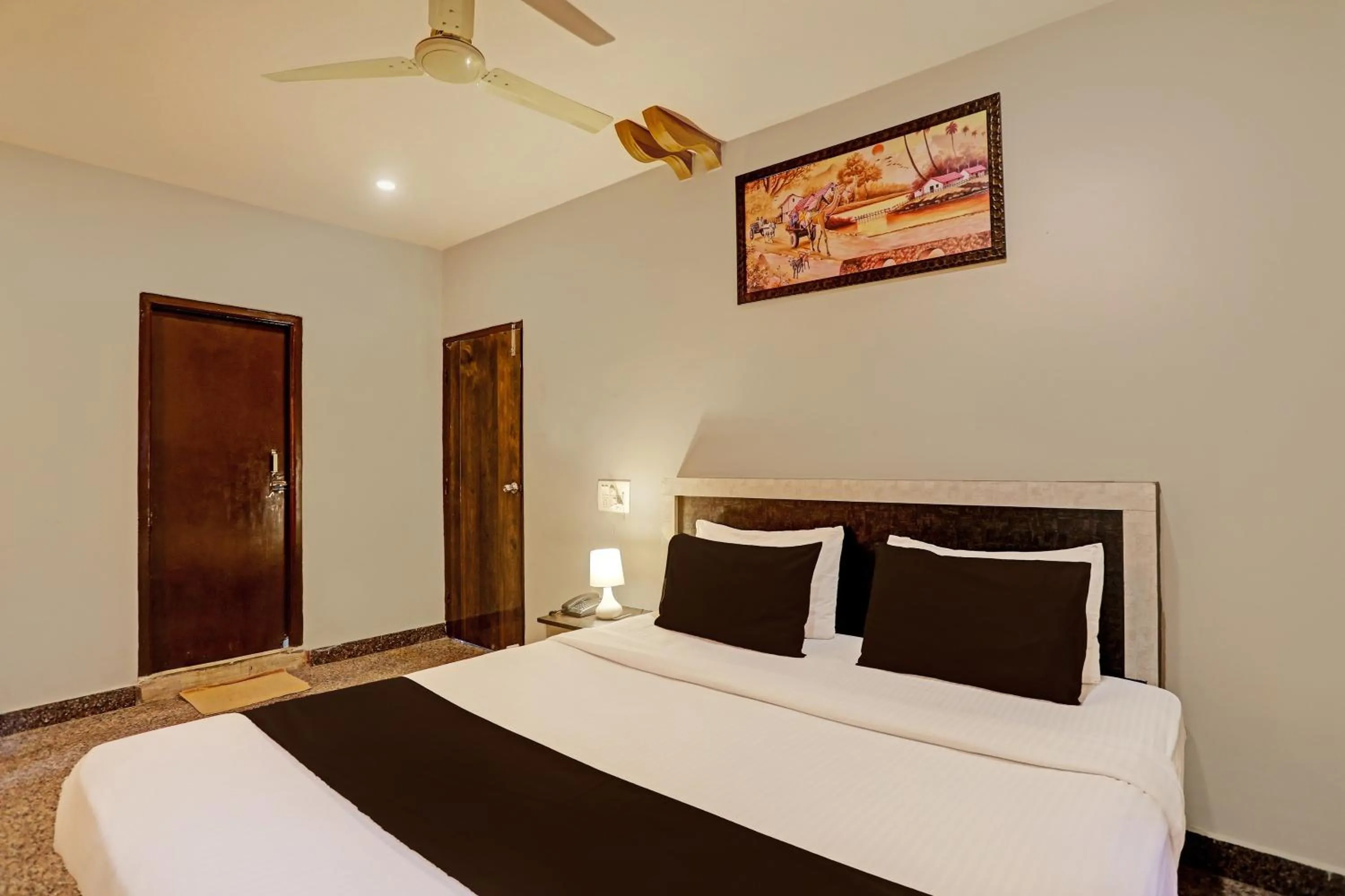 Bedroom, Bed in Super Capital O Vaishnavi