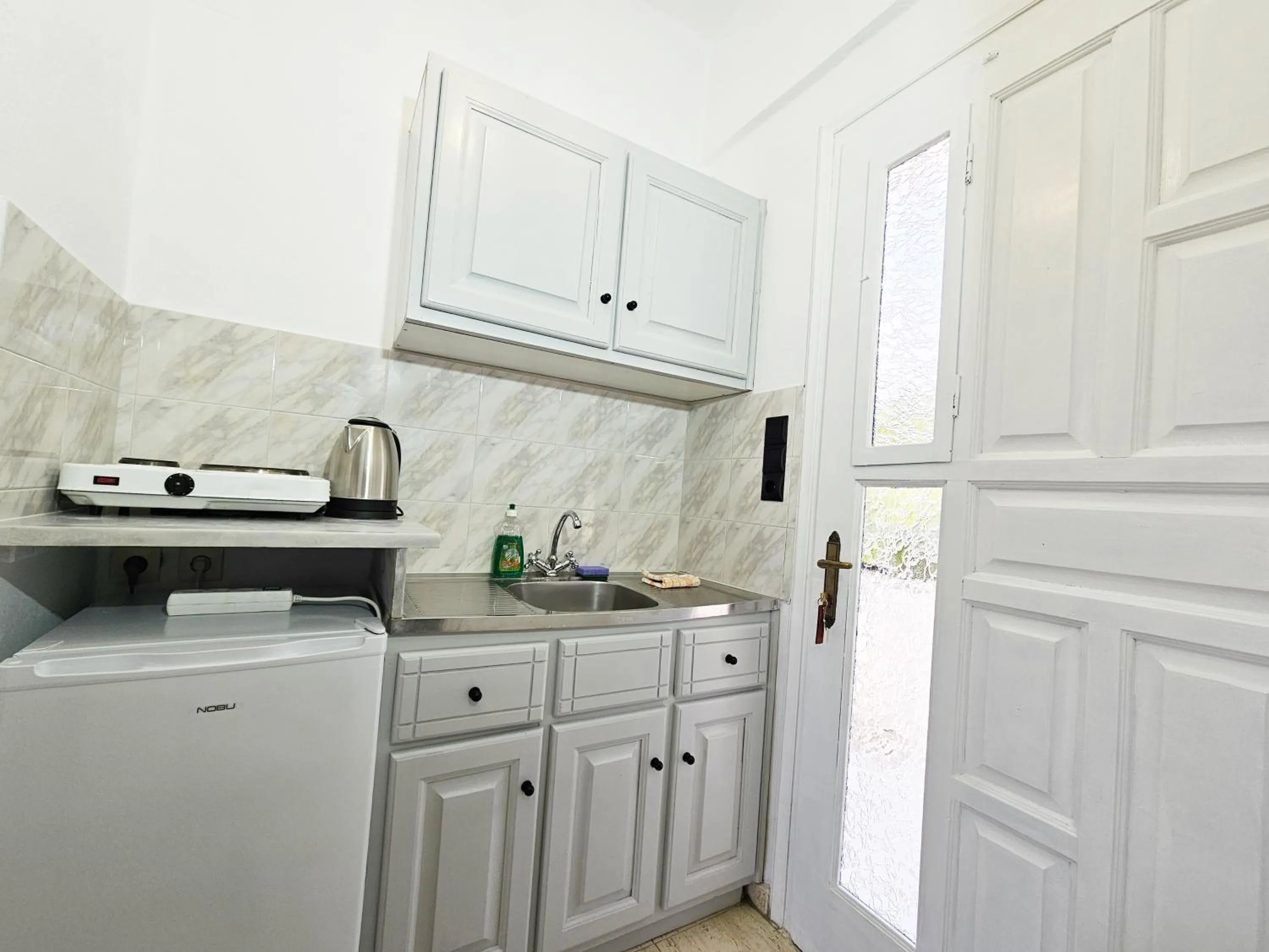 Kitchen or kitchenette in Pavlis Studios Kampos