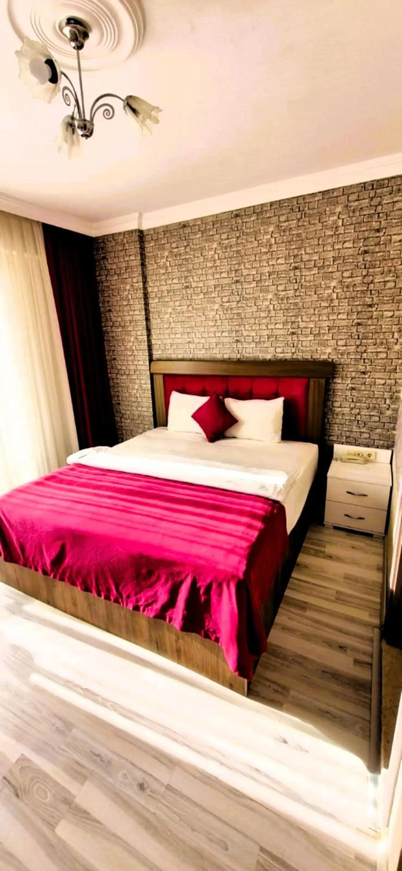 Bed in WİND HOTEL
