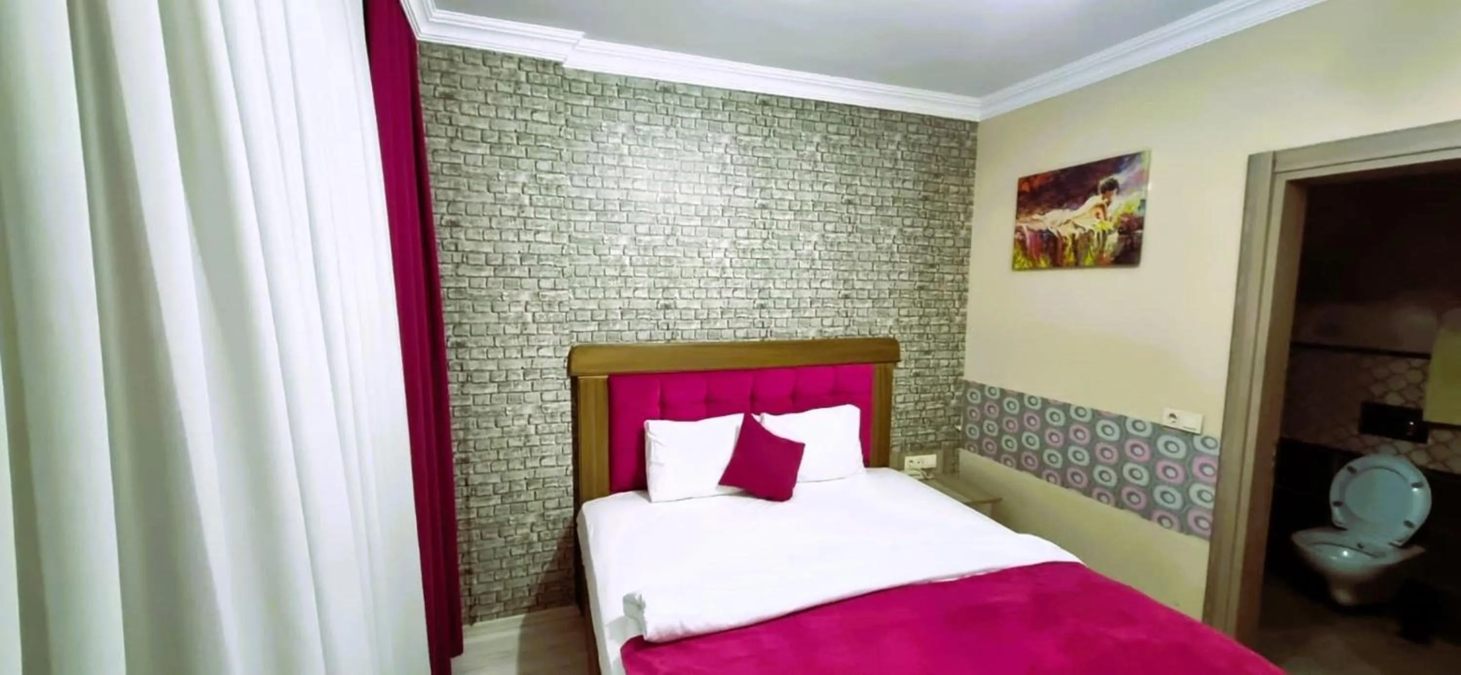 Photo of the whole room, Bed in WİND HOTEL