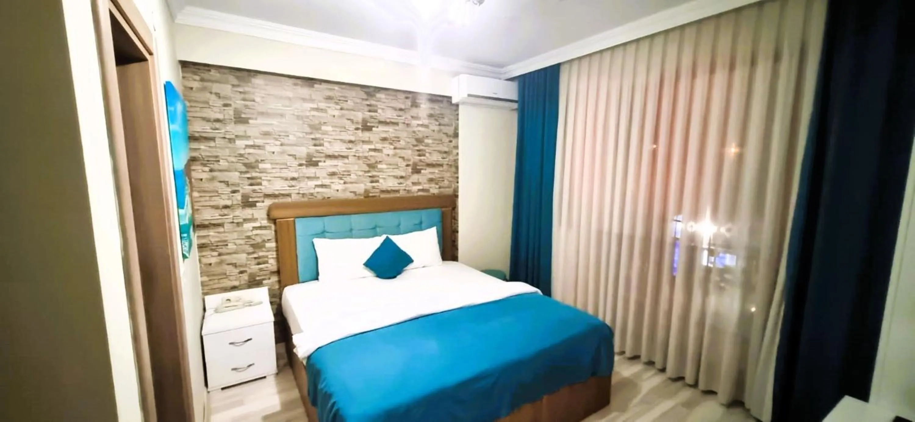 Photo of the whole room, Bed in WİND HOTEL