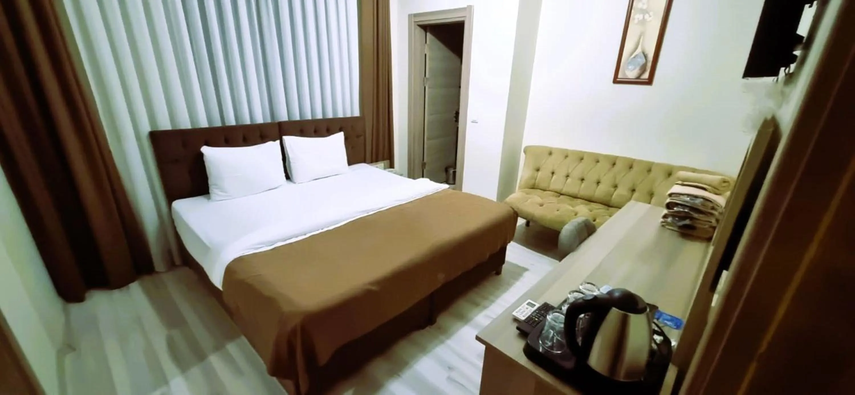 Photo of the whole room, Bed in WİND HOTEL