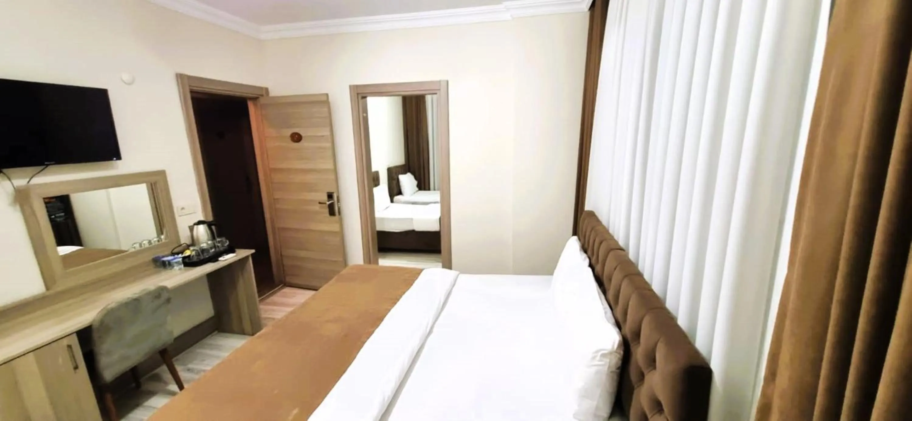 Photo of the whole room, Bed in WİND HOTEL