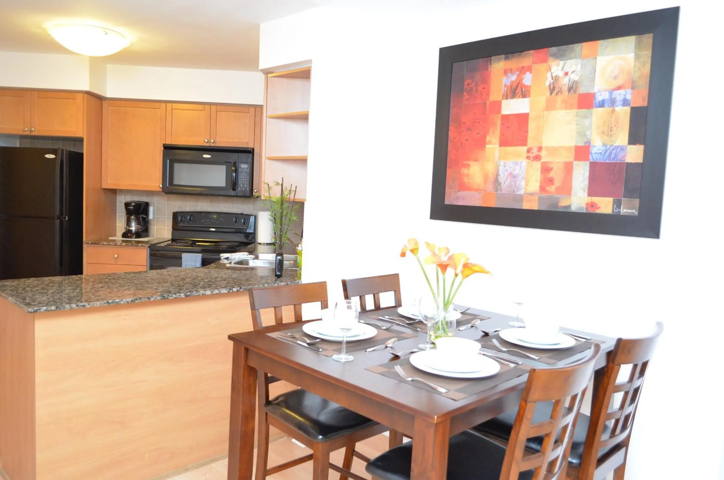 Dining area in Bombay Suites Mississauga