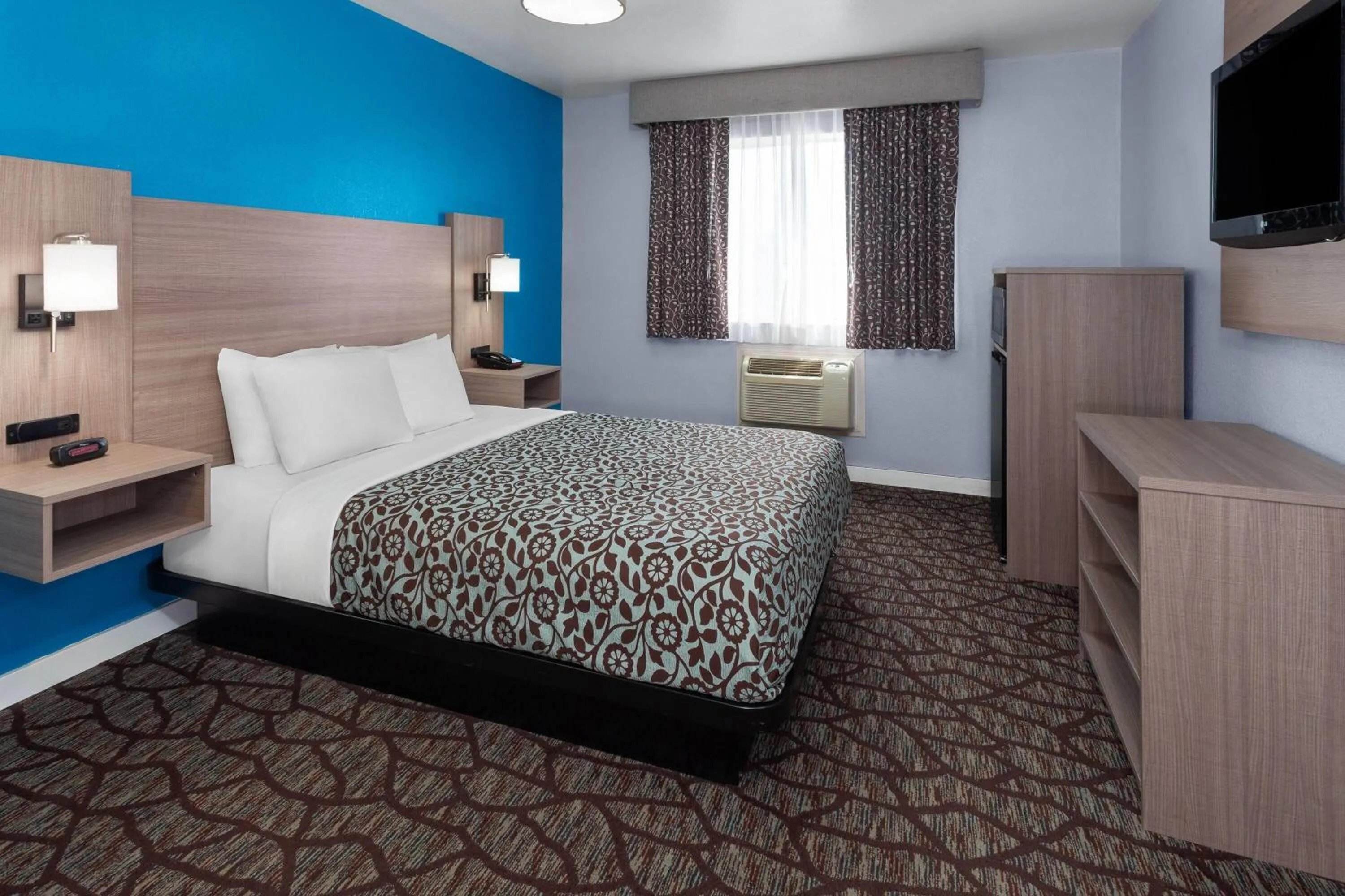 Photo of the whole room, Bed in Baymont by Wyndham Manistee