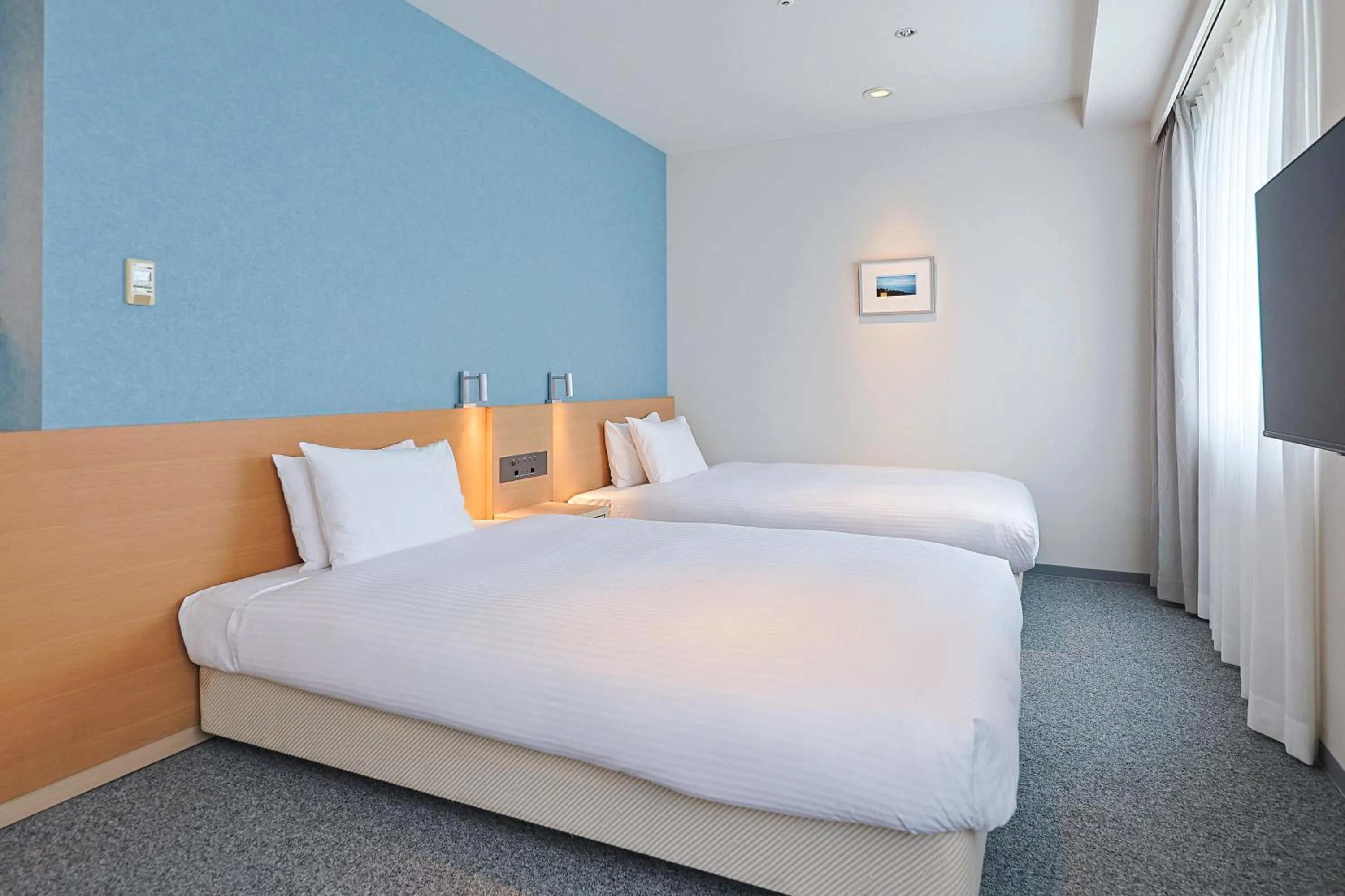 Photo of the whole room, Bed in JR Kyushu Hotel Miyazaki