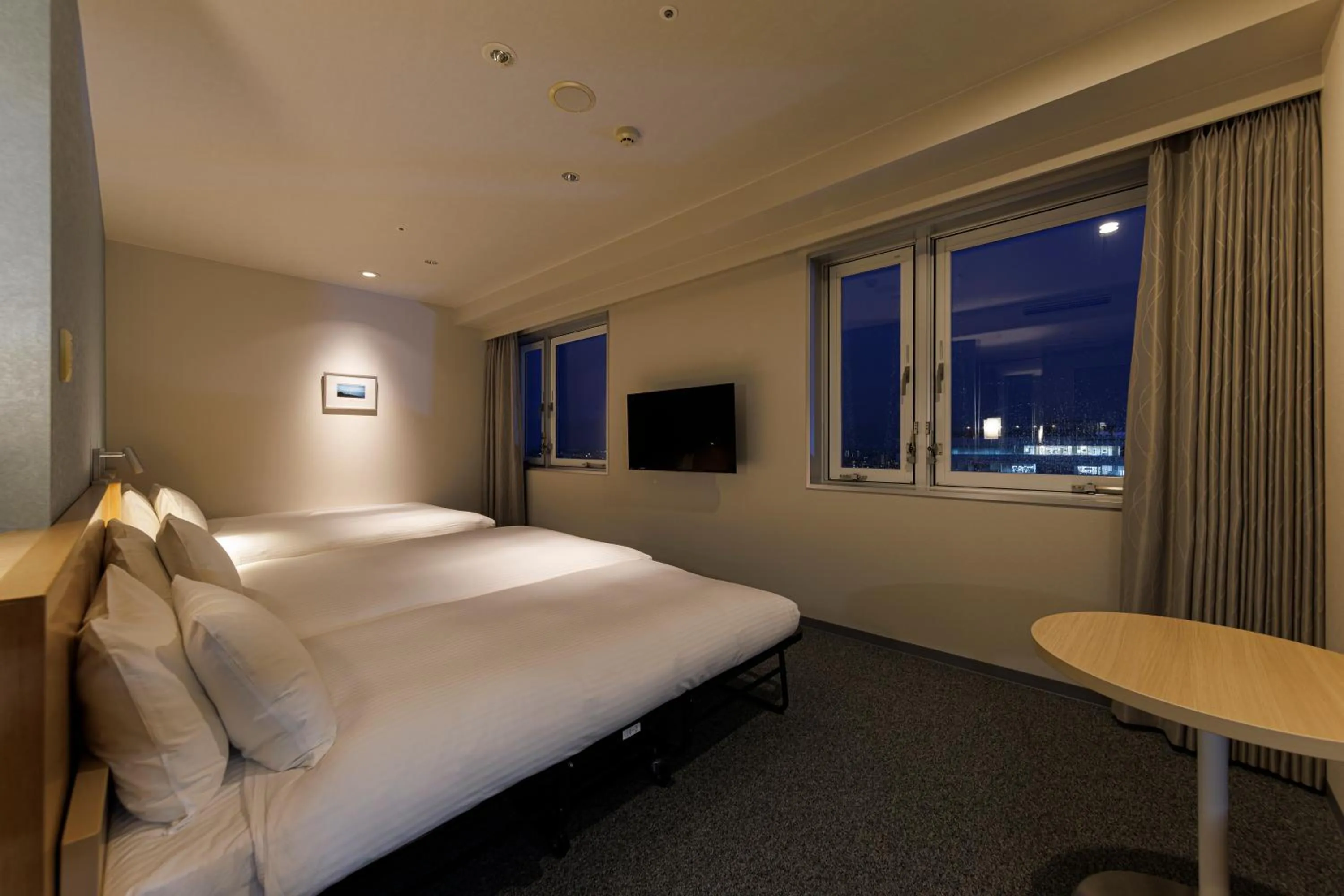 Photo of the whole room, Bed in JR Kyushu Hotel Miyazaki