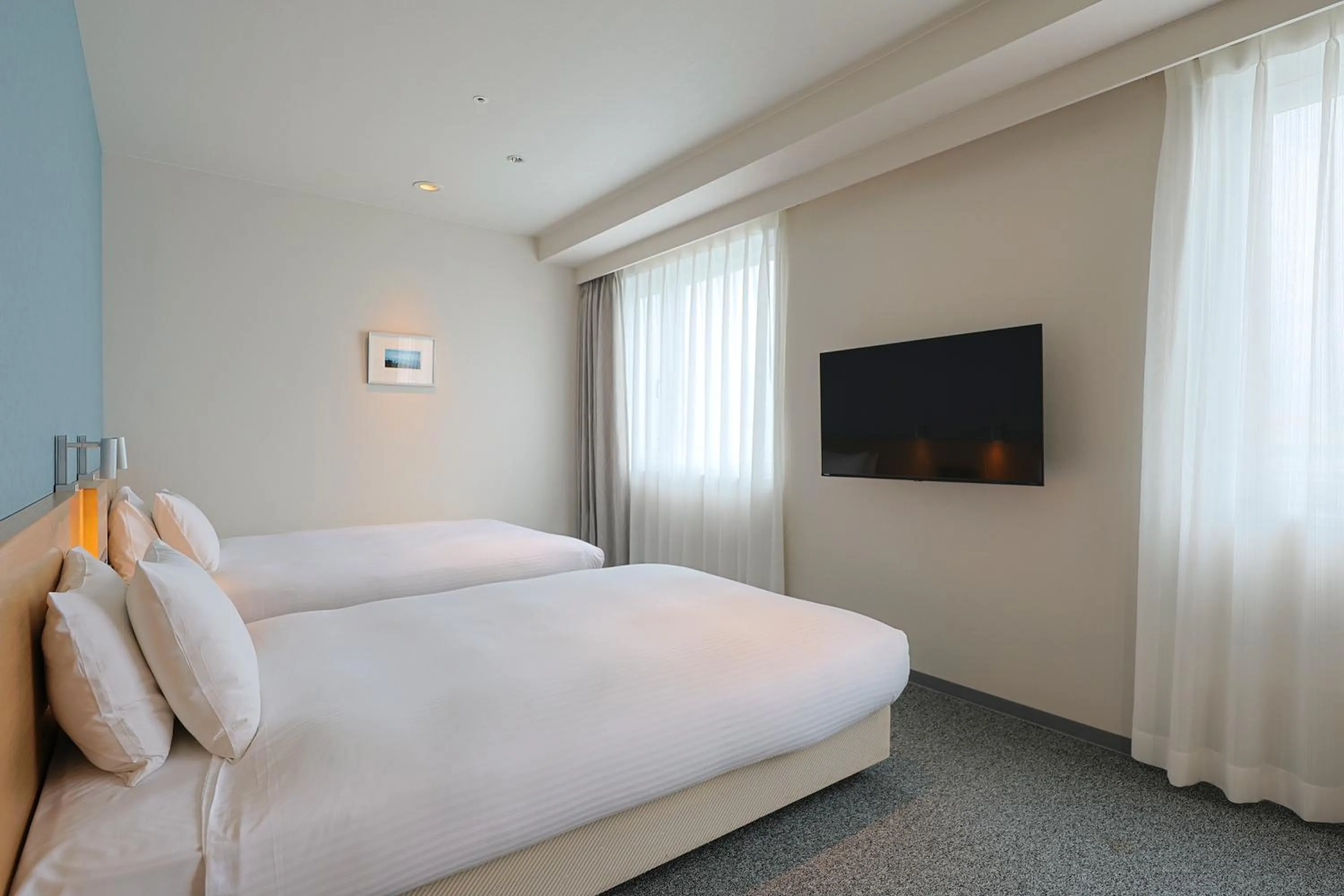 Photo of the whole room, Bed in JR Kyushu Hotel Miyazaki