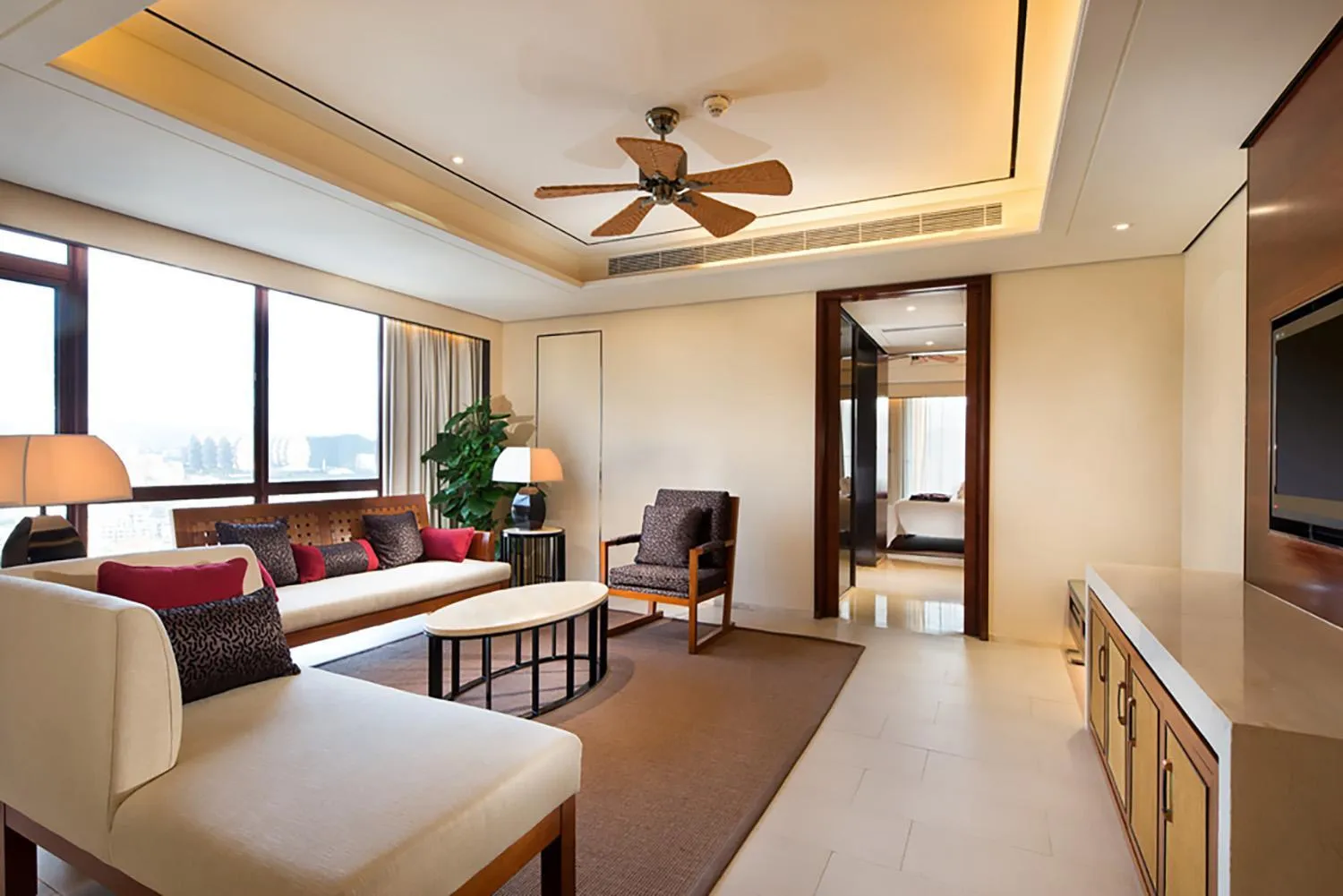 Living room in Crowne Plaza Sanya City Center by IHG