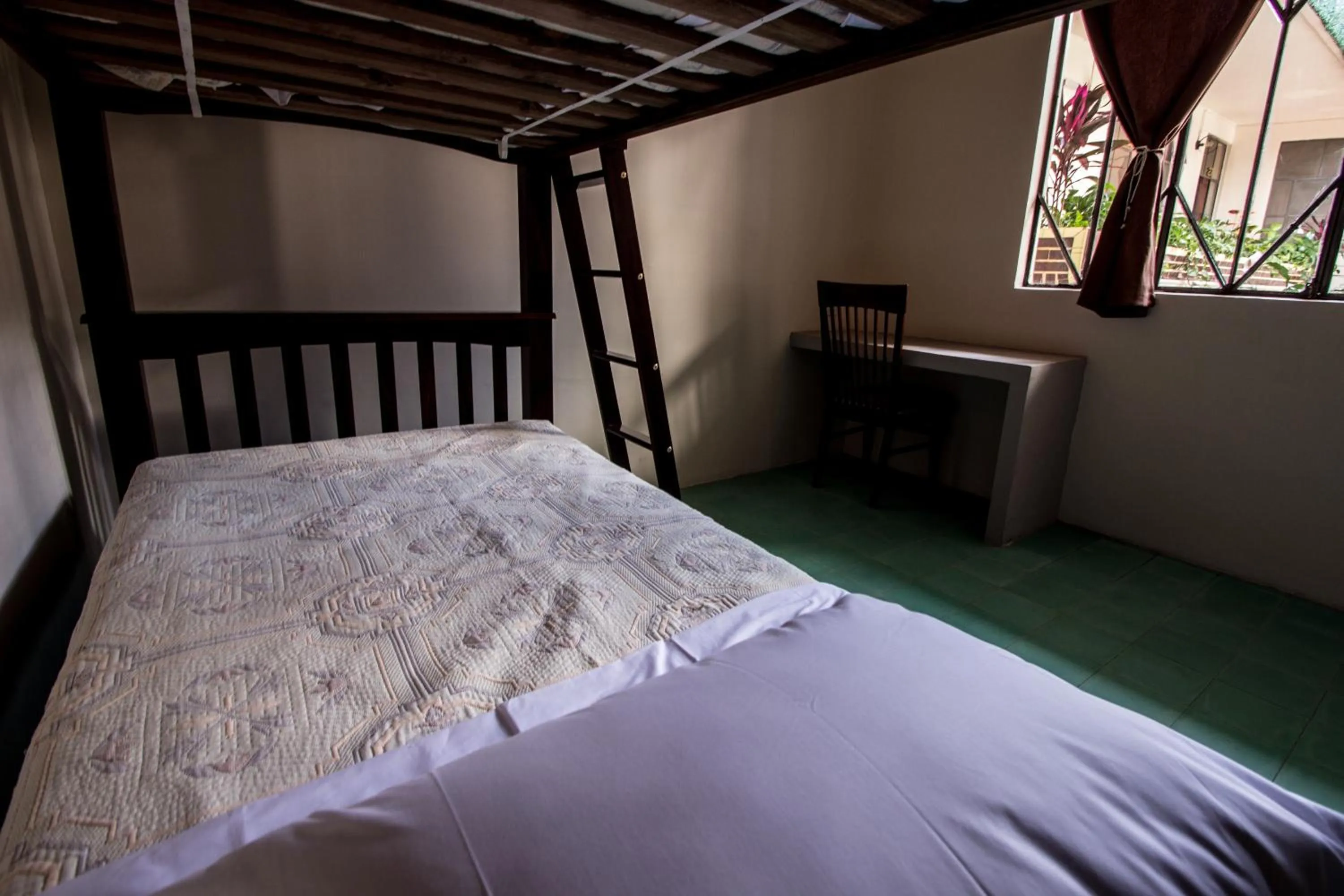 Bed in Casa de Juan Hostal