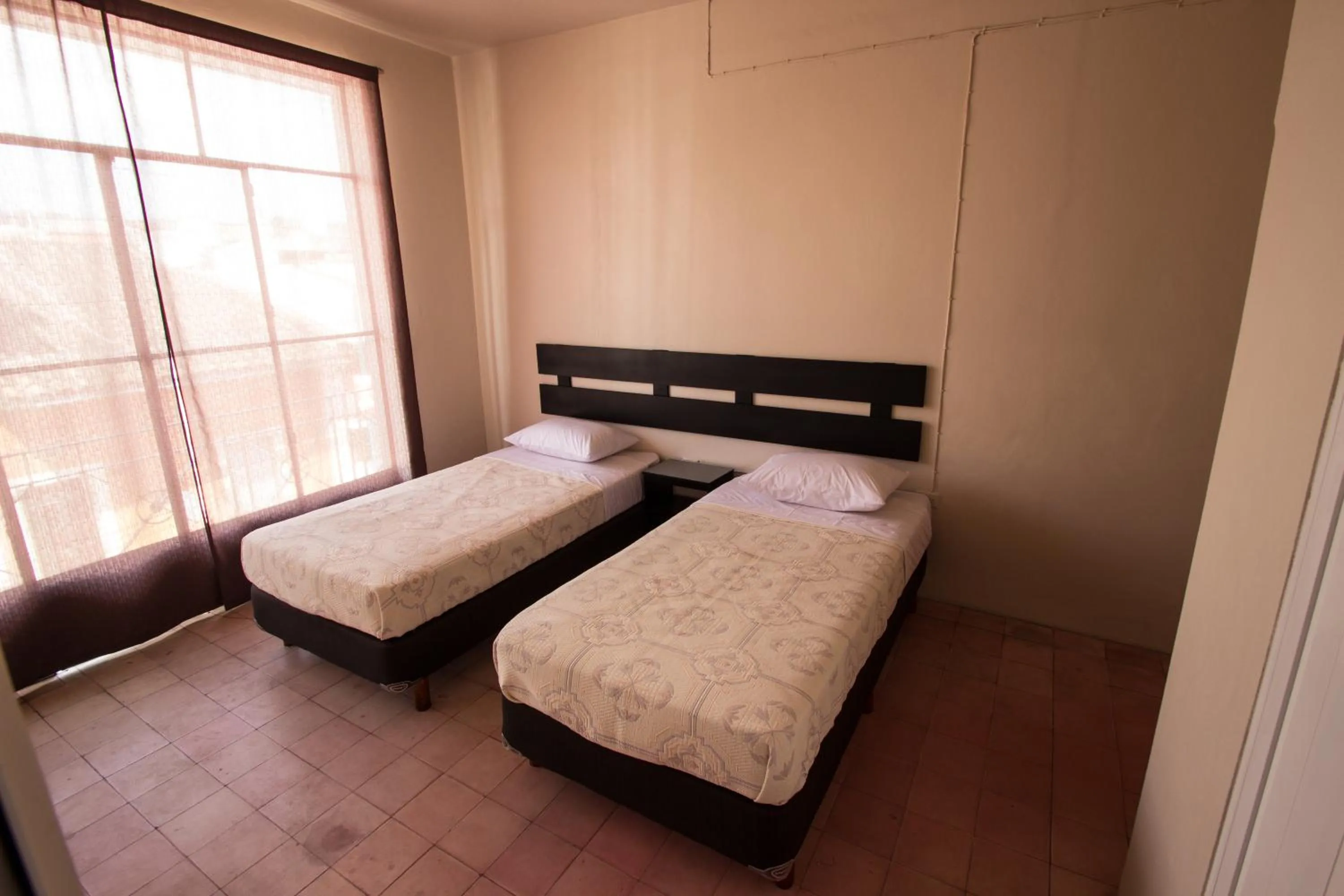Bed in Casa de Juan Hostal