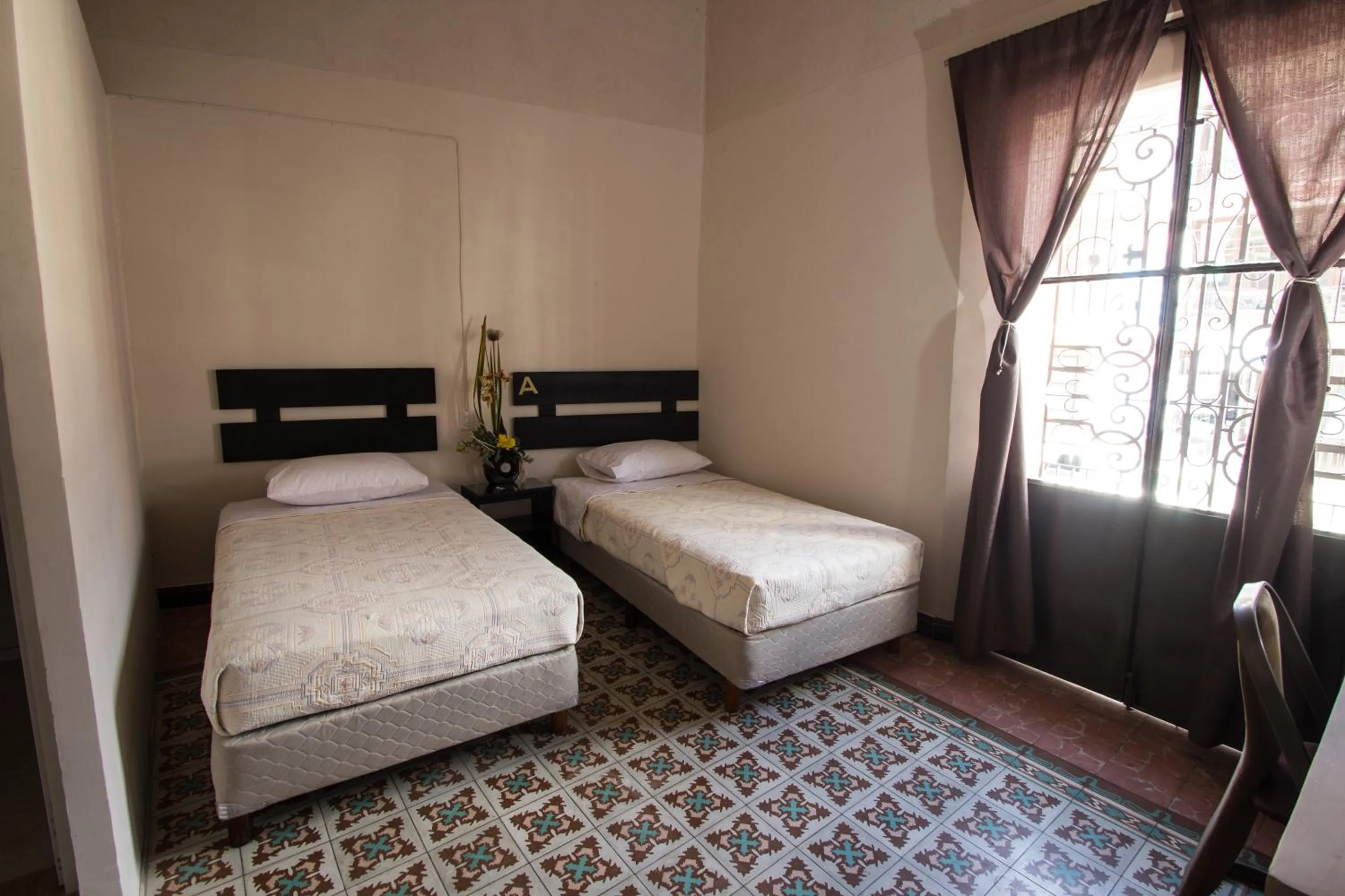 Bed in Casa de Juan Hostal