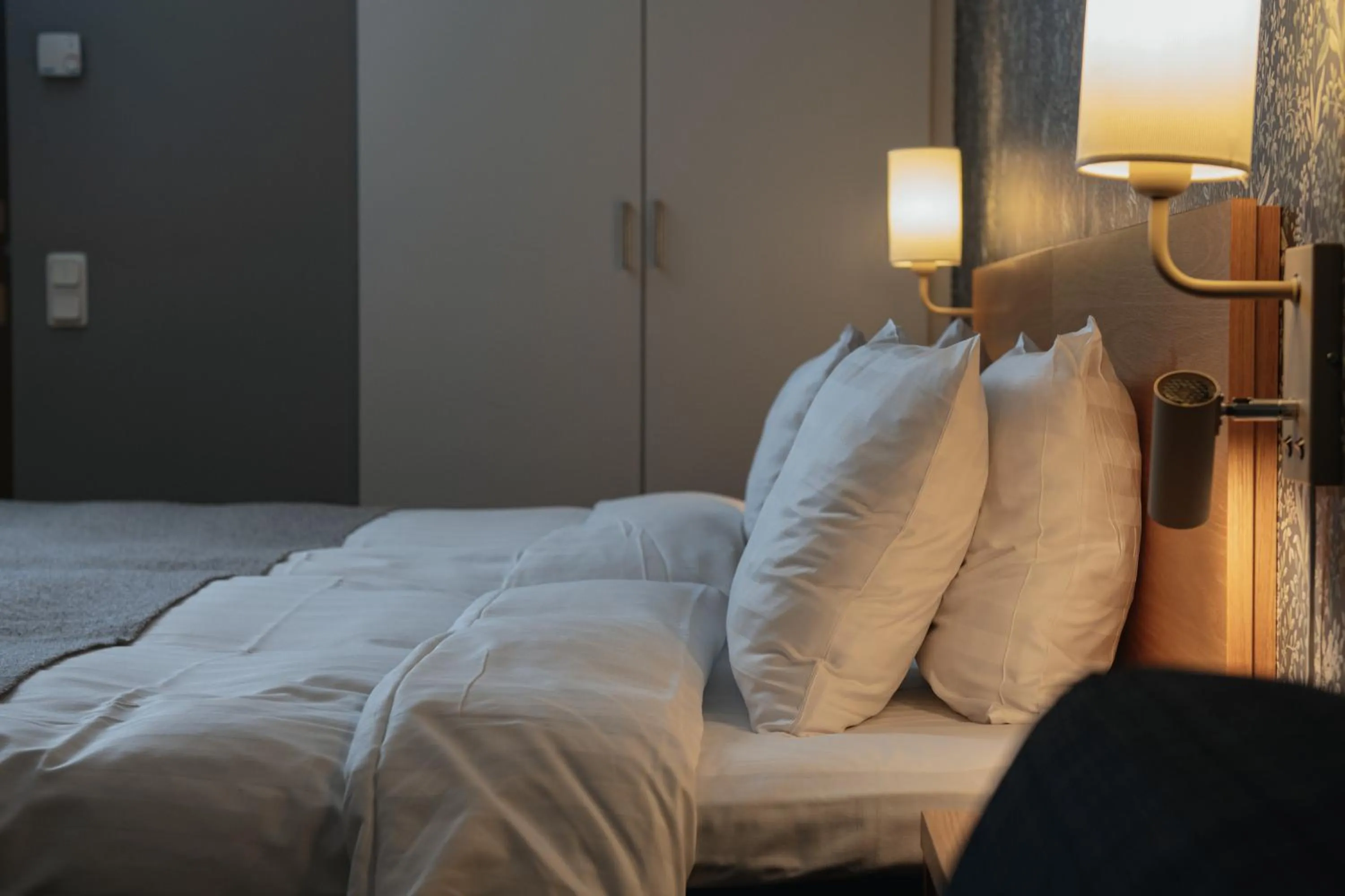 Bed in Home Hotel Mektagonen