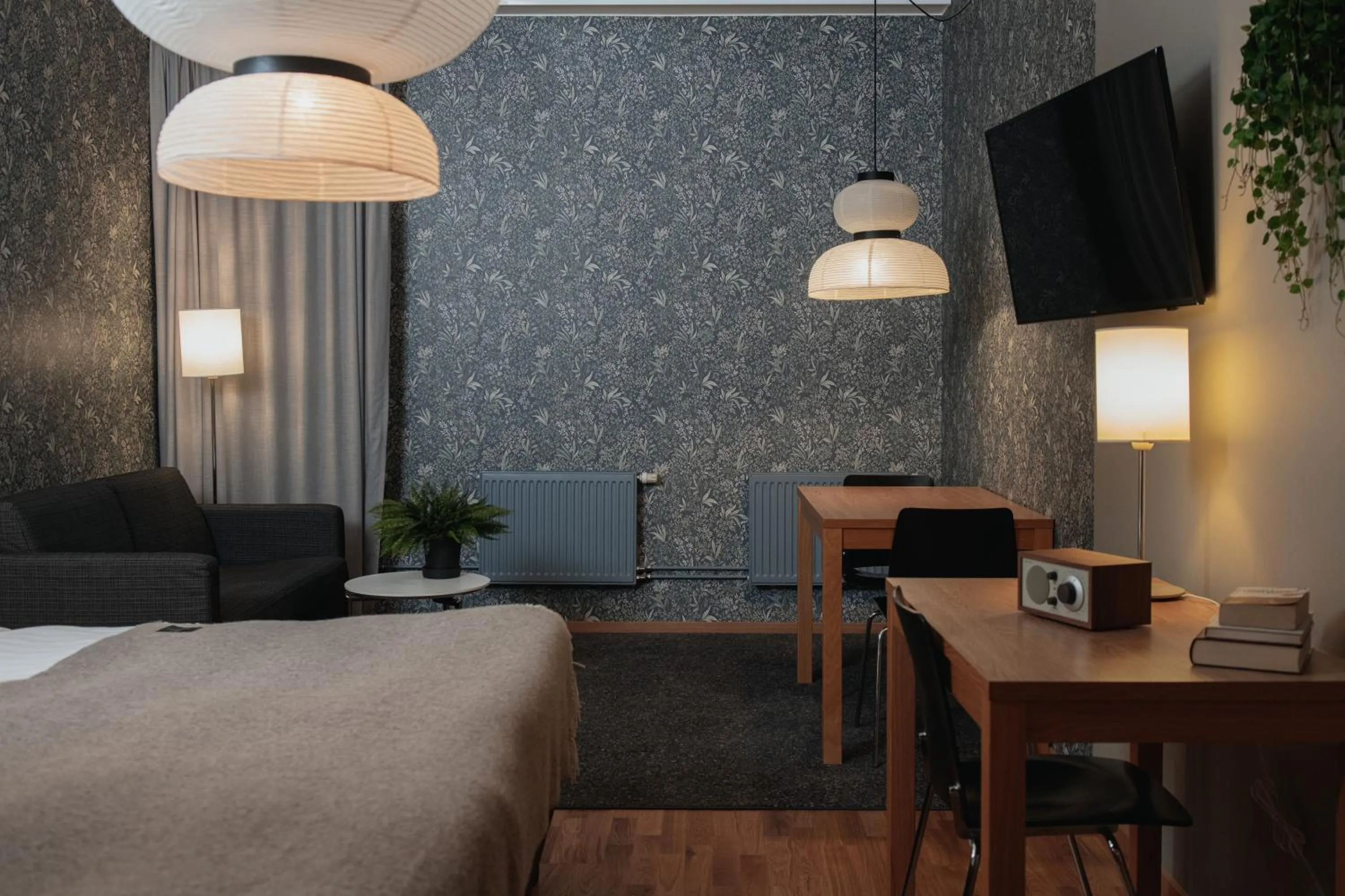 Bed in Home Hotel Mektagonen