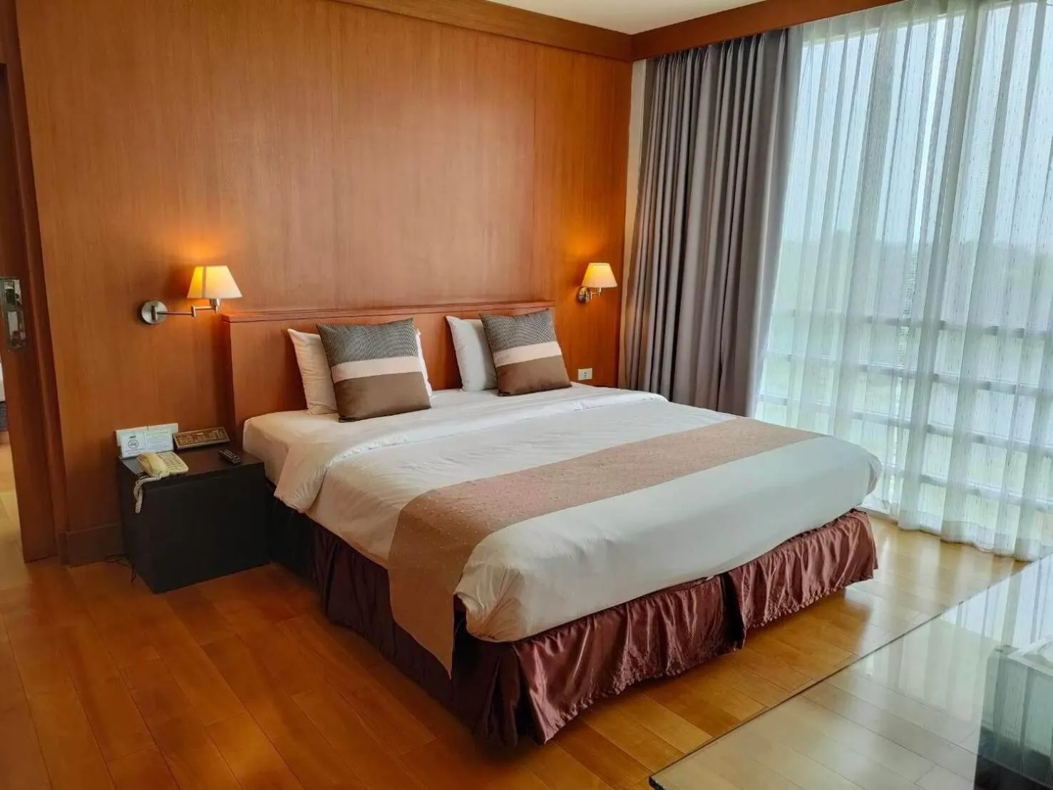 Bed in Uniland Golf & Resort