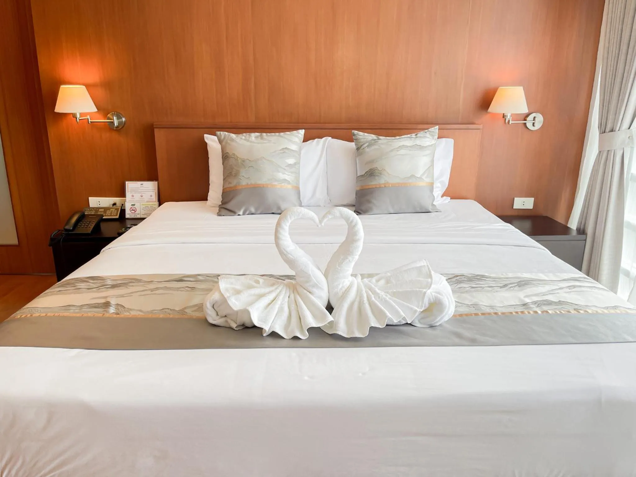 Bed in Uniland Golf & Resort