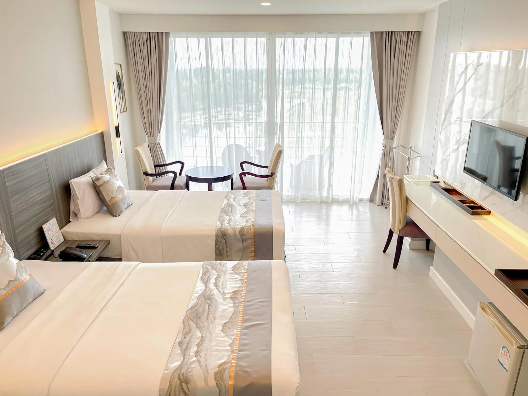 Bed in Uniland Golf & Resort