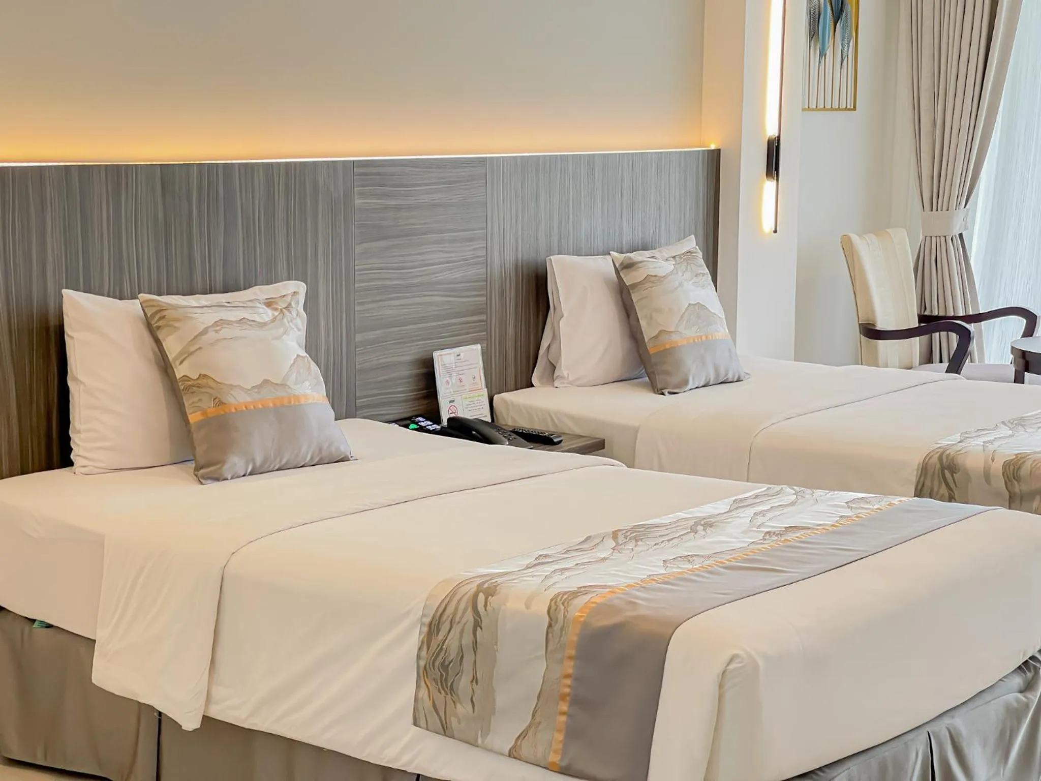 Bed in Uniland Golf & Resort