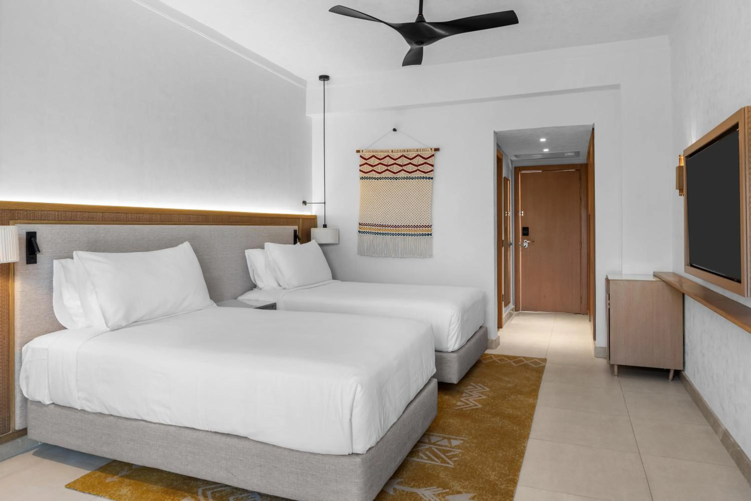 Bed in DoubleTree by Hilton Sharks Bay Resort