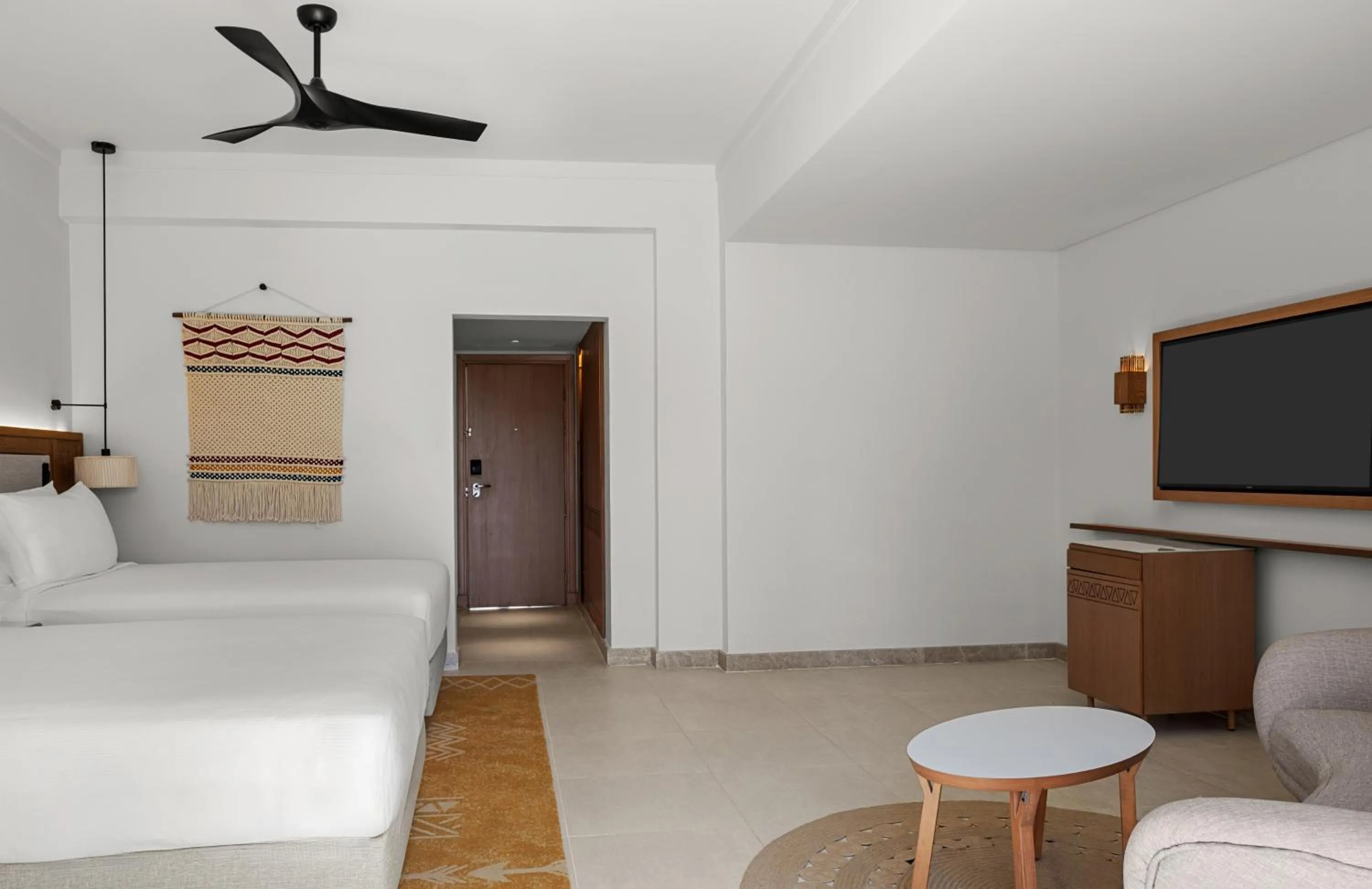 Seating area, Bed in DoubleTree by Hilton Sharks Bay Resort