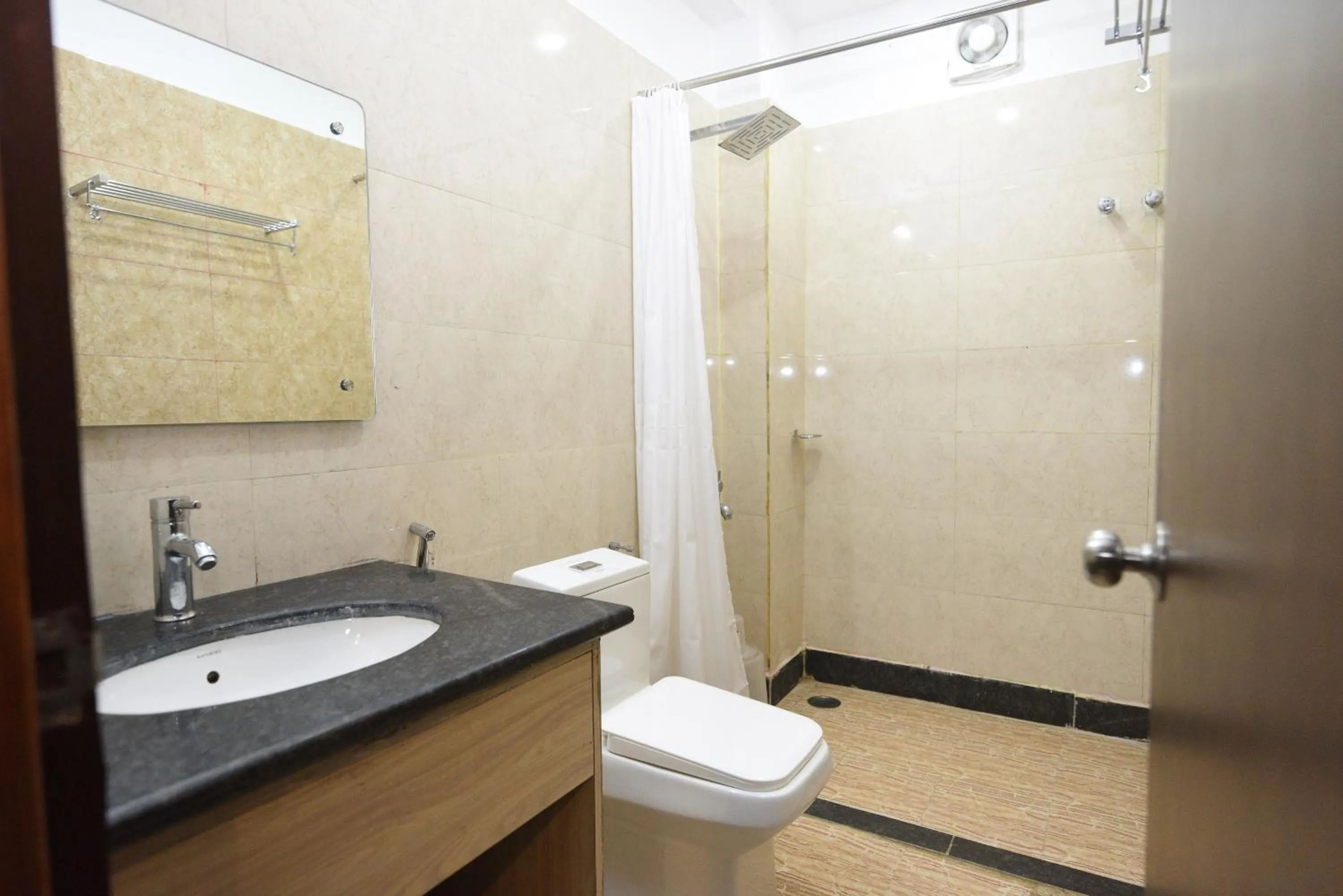 Bathroom in Hotel Nilay Residency