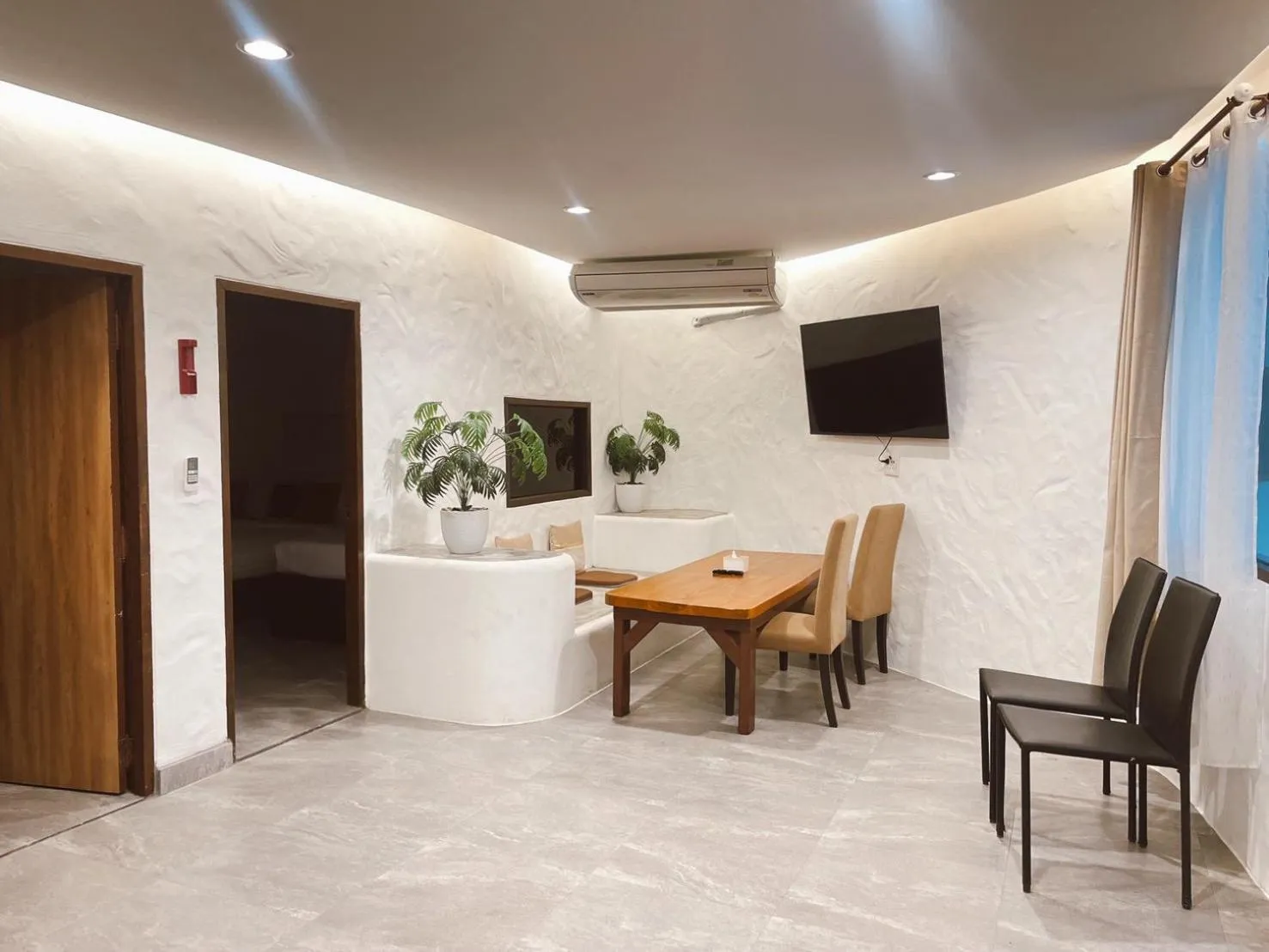 Living room in The Hub Erawan Resort