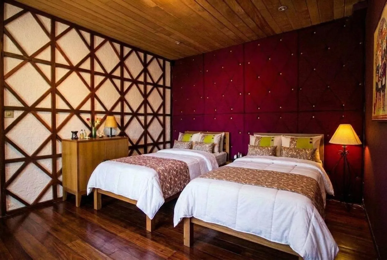 Bed in ViewPoint Ecolodge