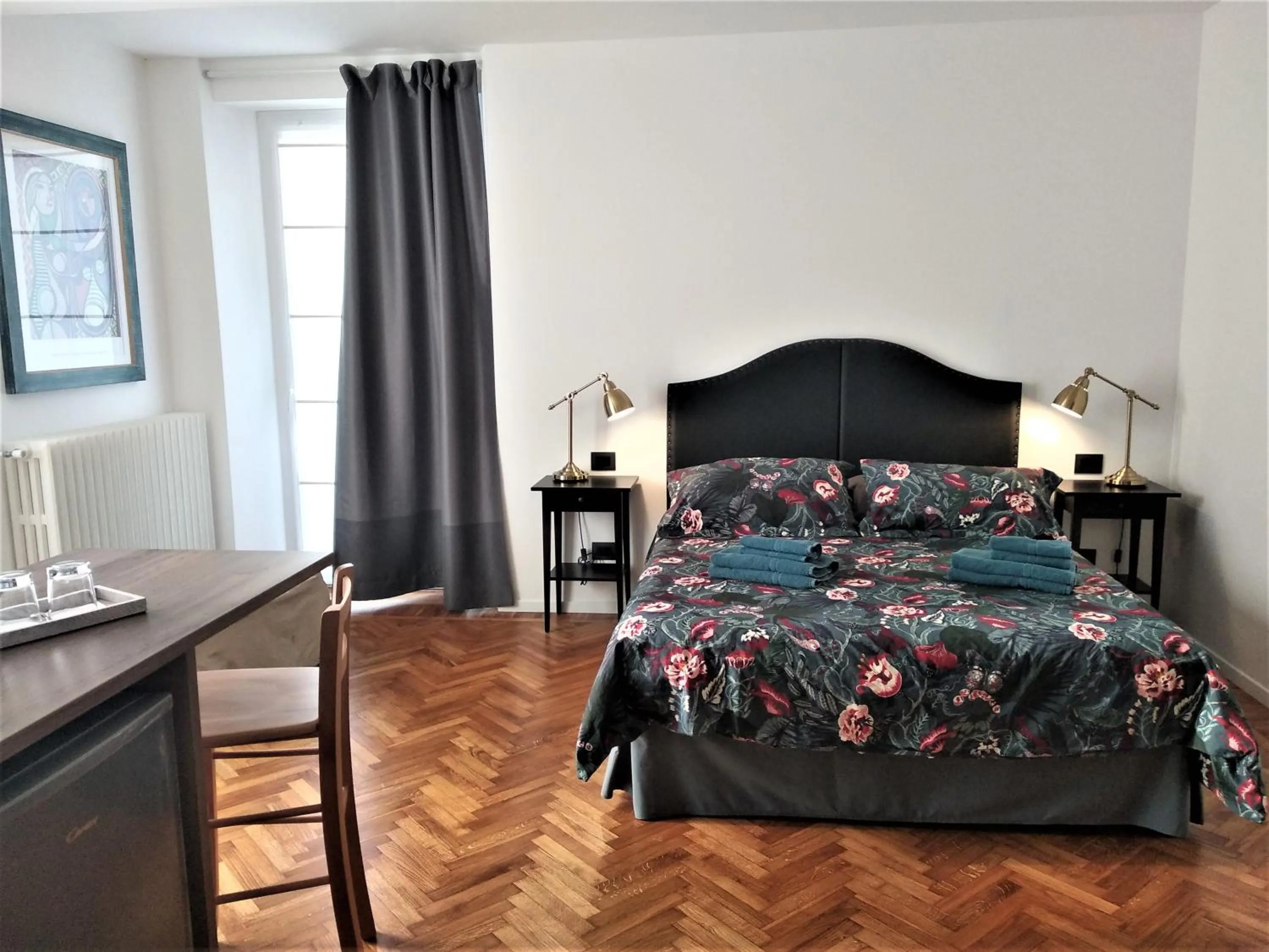 Photo of the whole room, Bed in Residenza Laurum