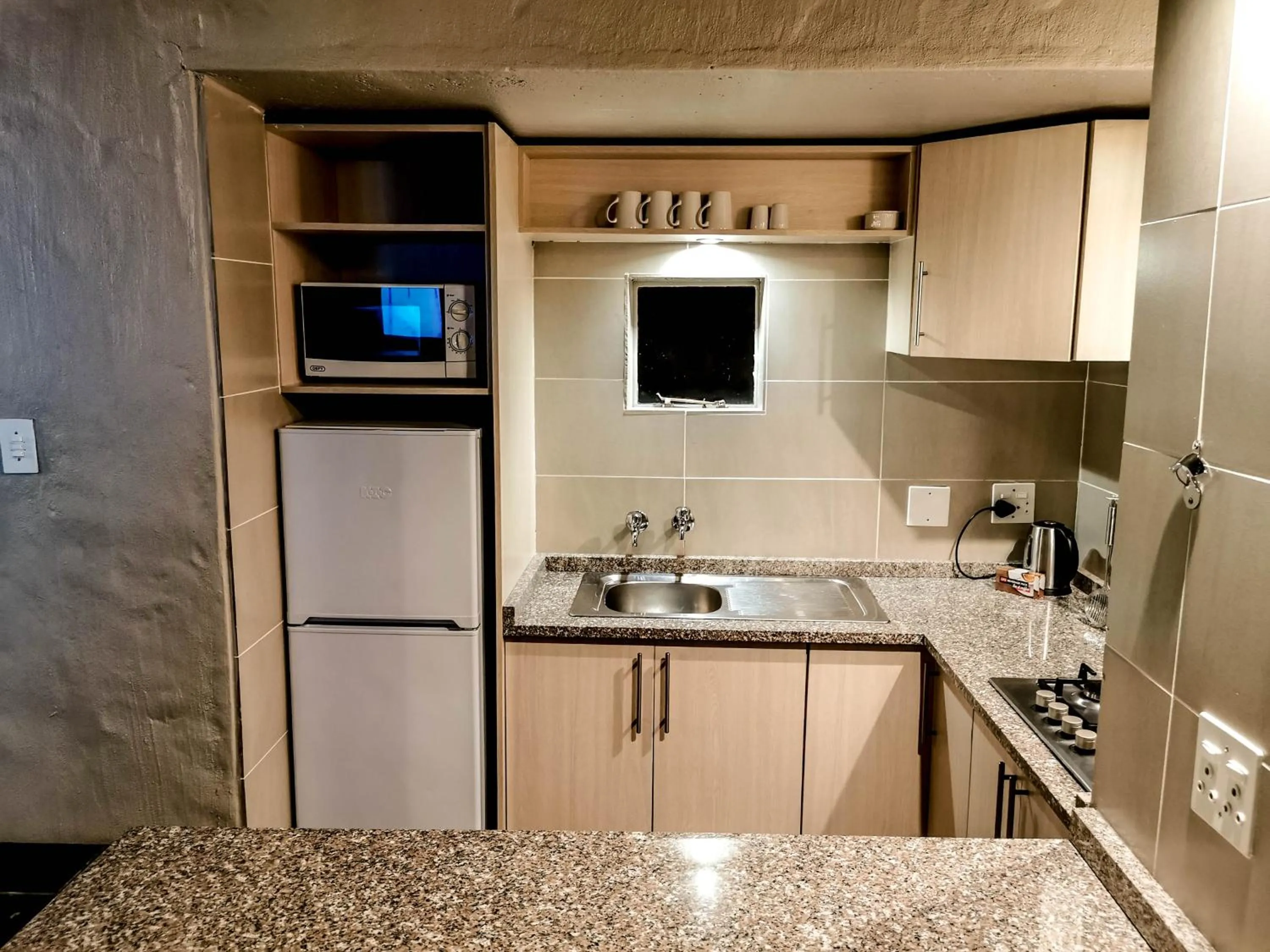 Kitchen or kitchenette in Umuzi Lodge