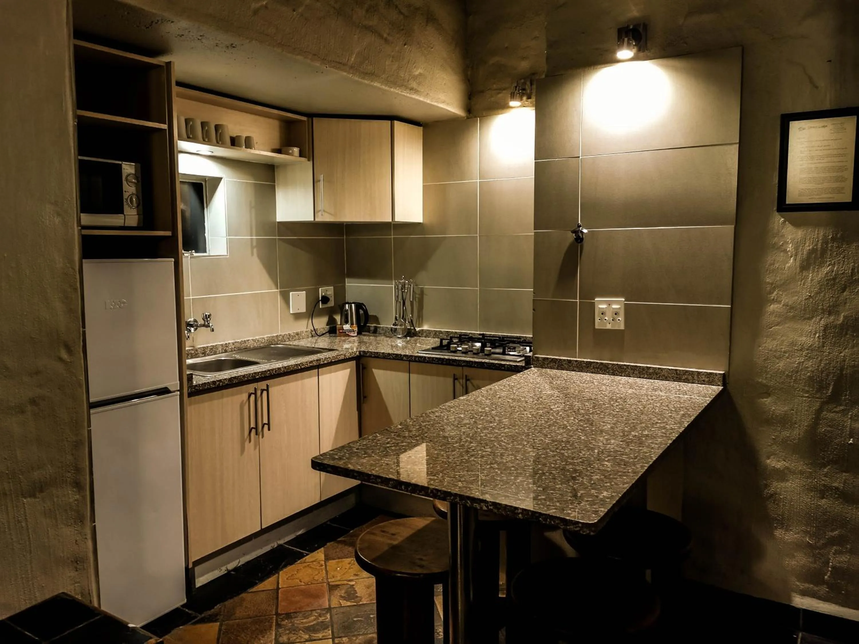 Kitchen or kitchenette in Umuzi Lodge