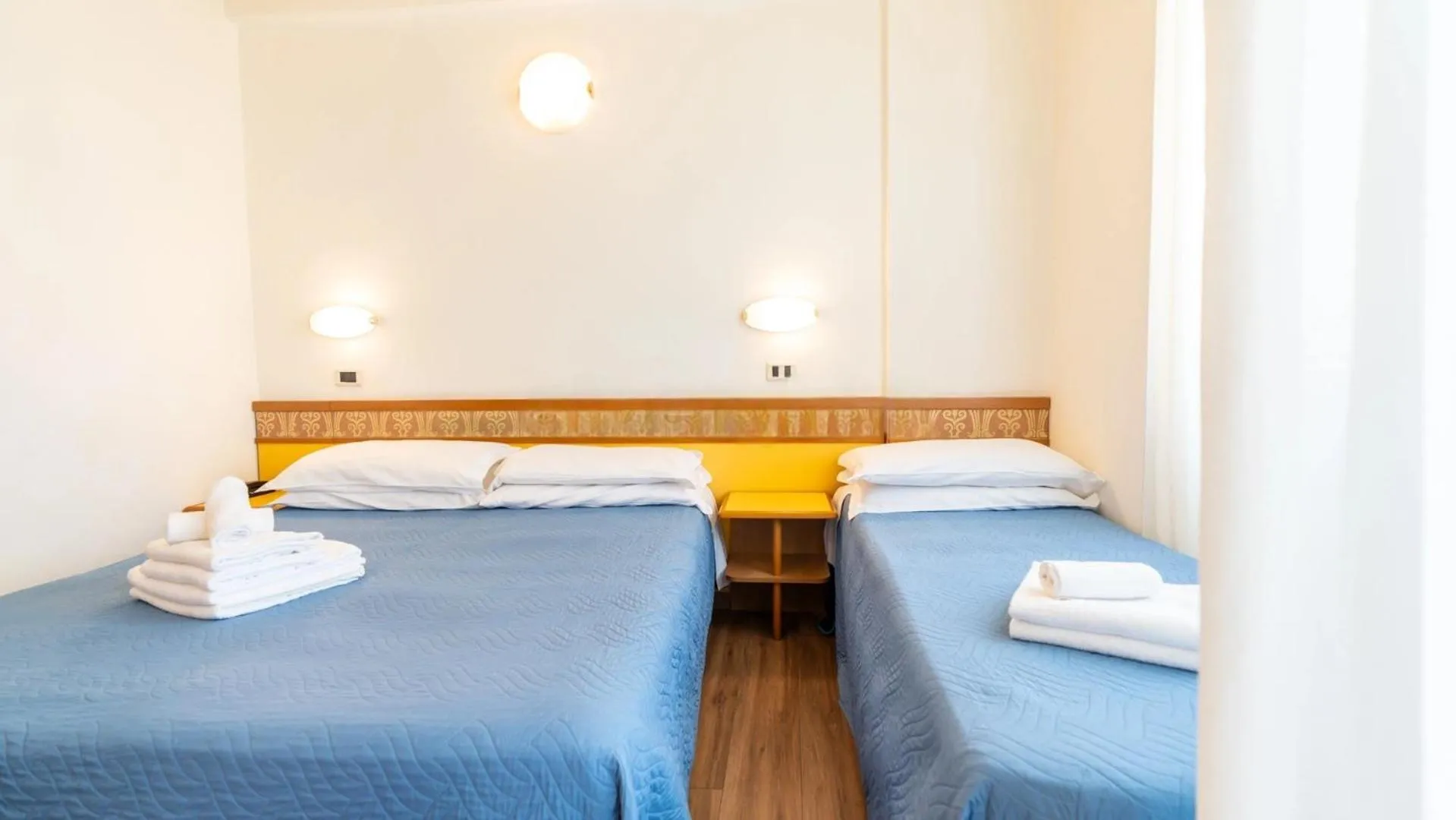 Bed in Hotel Cosmopol Cesenatico