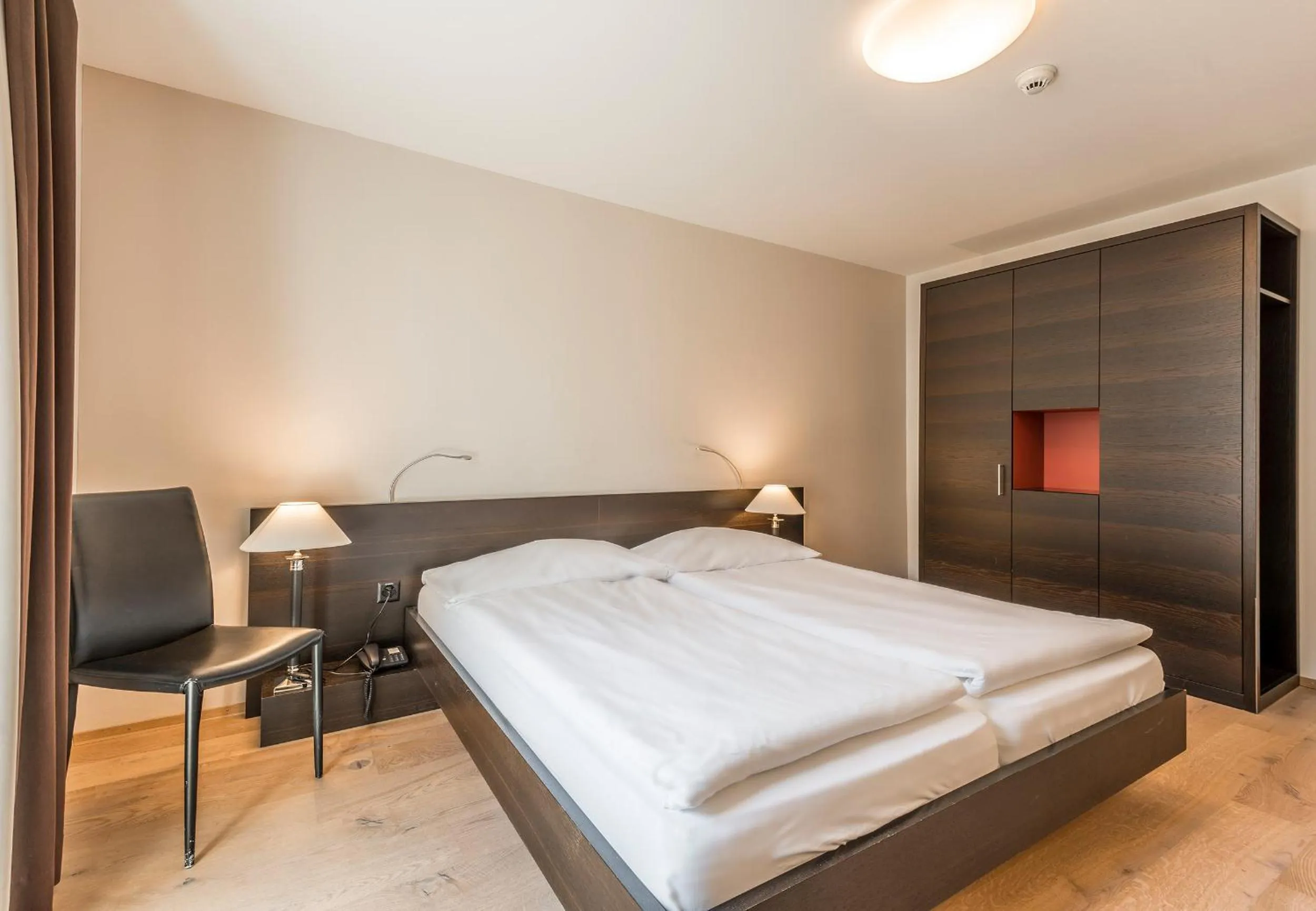 Bed in Hotel Alpina Luzern