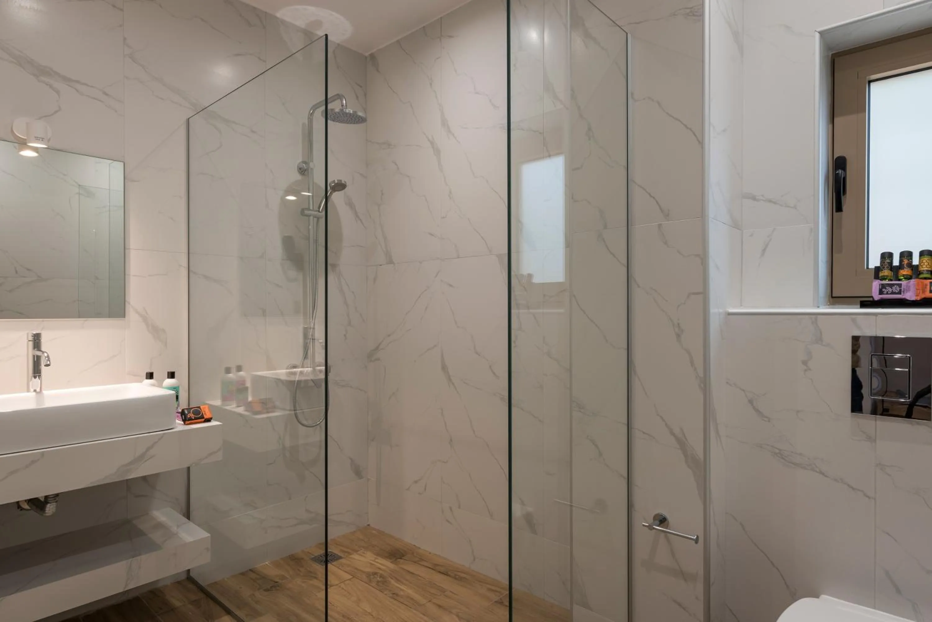 Shower in Aequor Luxury Rooms & Apartments