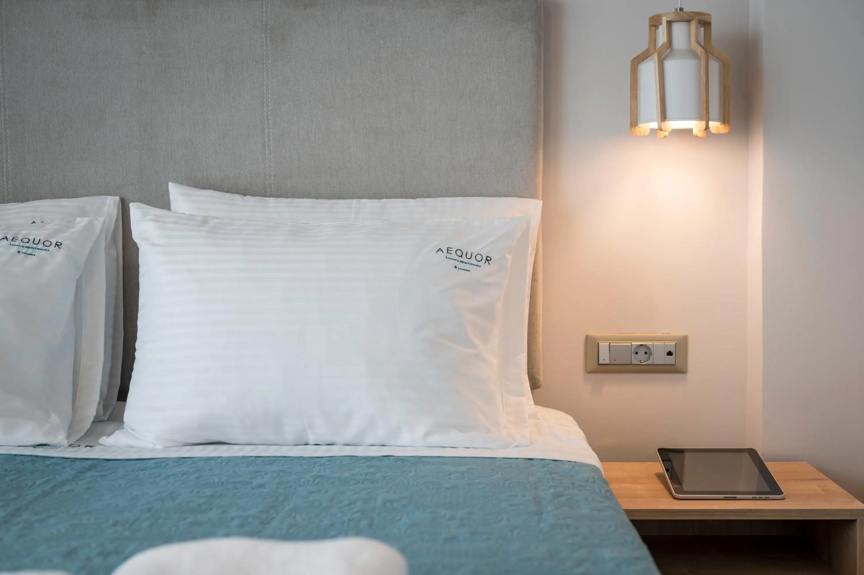 Bed in Aequor Luxury Rooms & Apartments