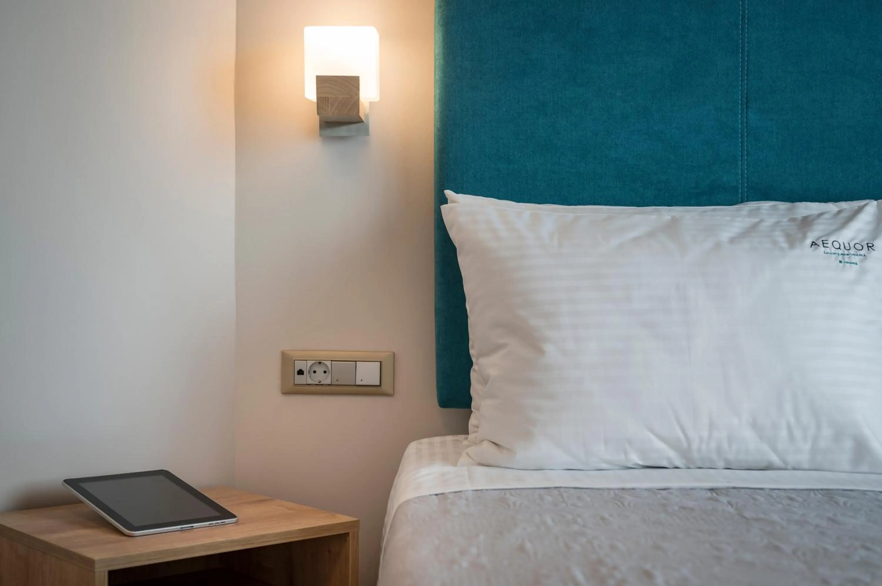 Bed in Aequor Luxury Rooms & Apartments