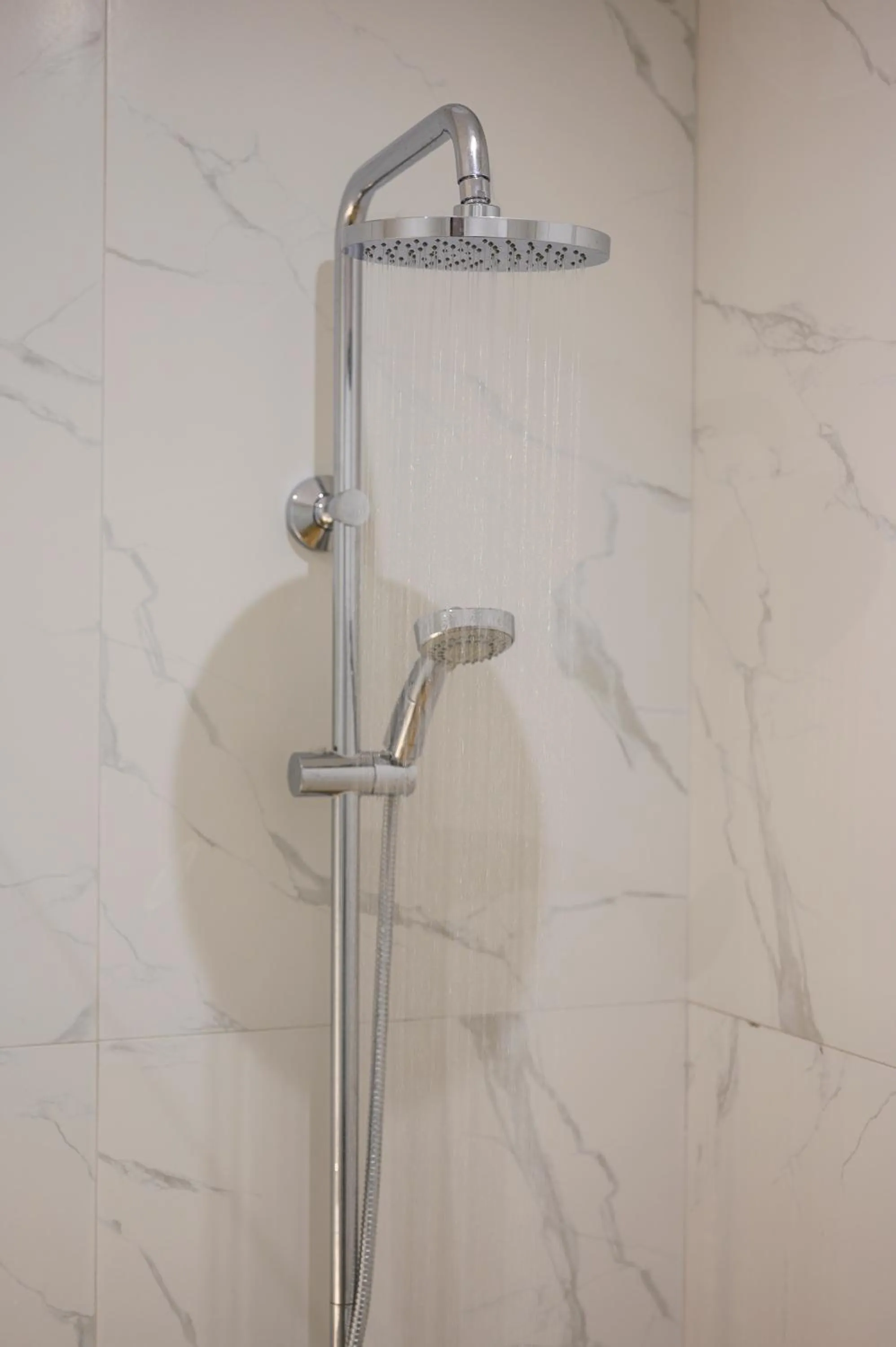 Shower in Aequor Luxury Rooms & Apartments