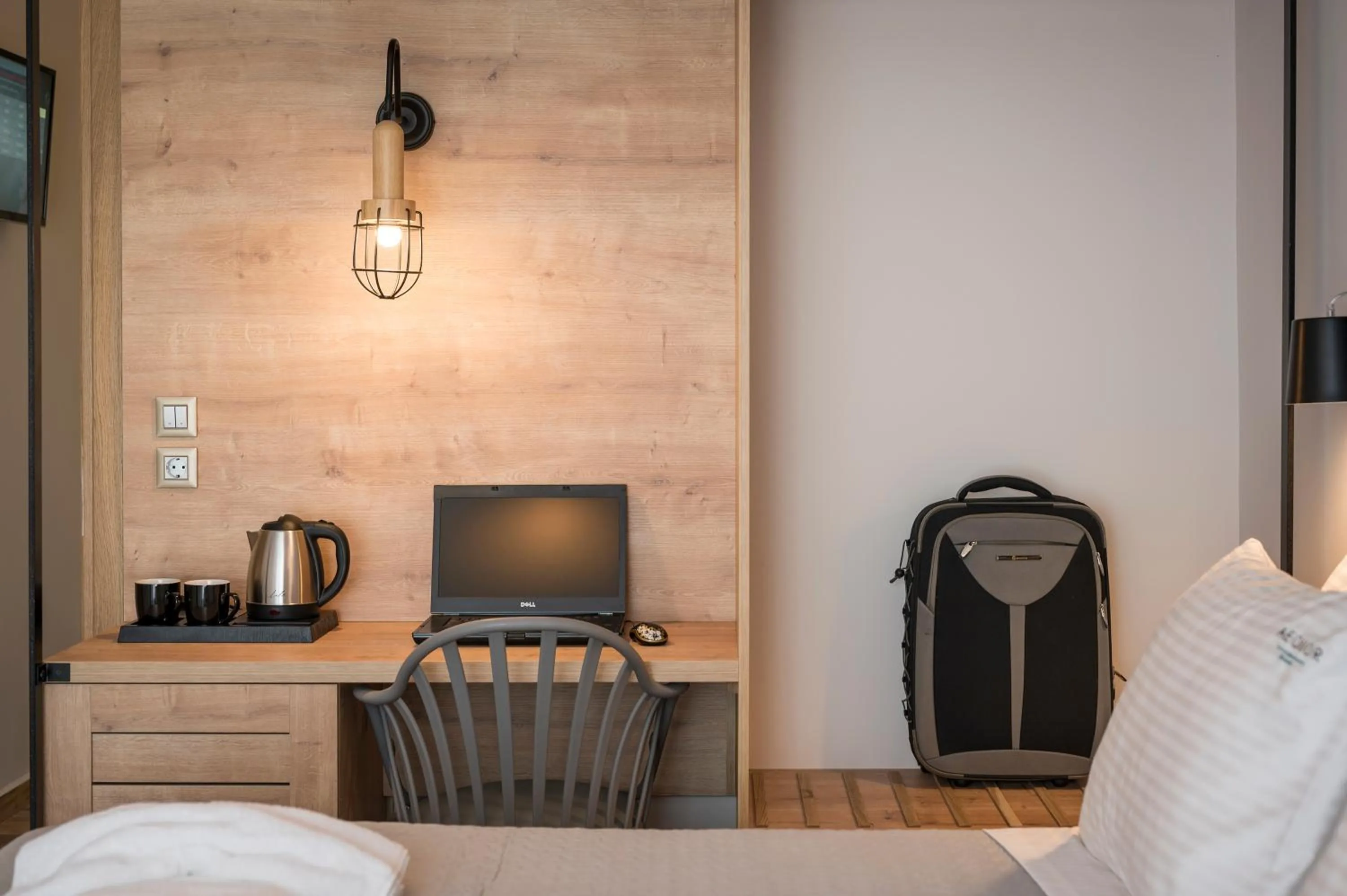 Seating area, Bed in Aequor Luxury Rooms & Apartments