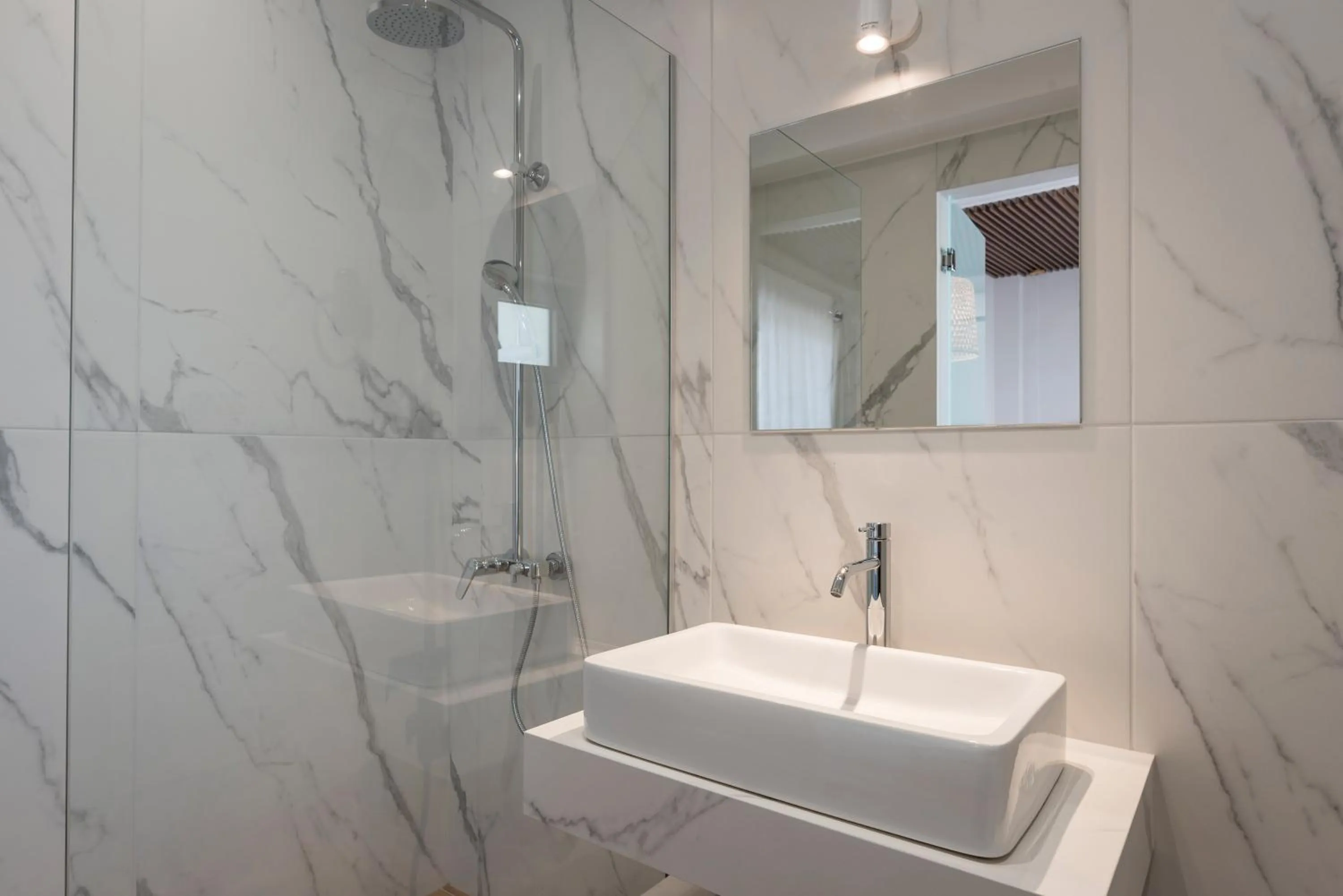 Shower in Aequor Luxury Rooms & Apartments