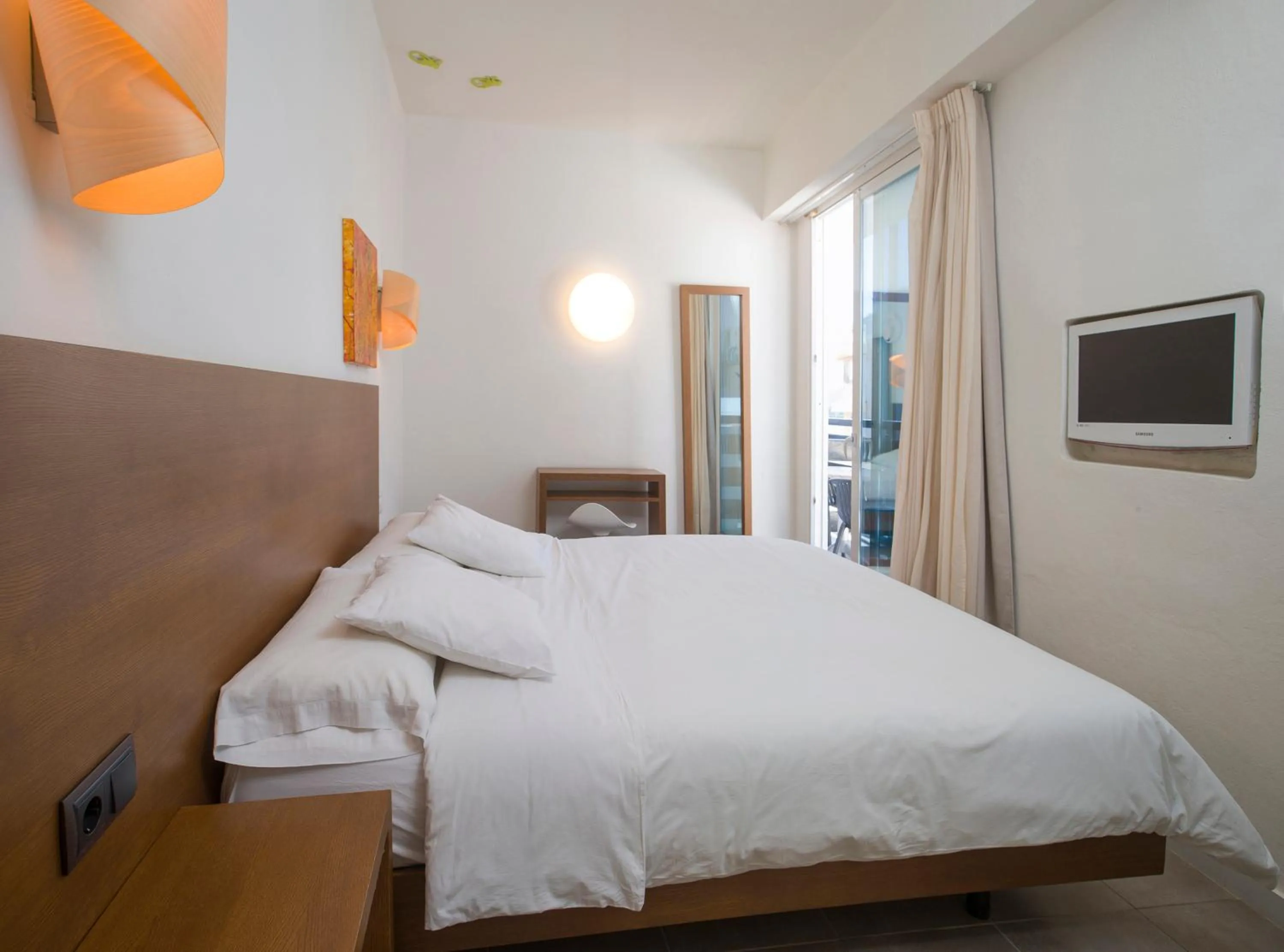 Bedroom, Bed in Es Mitjorn Hotel