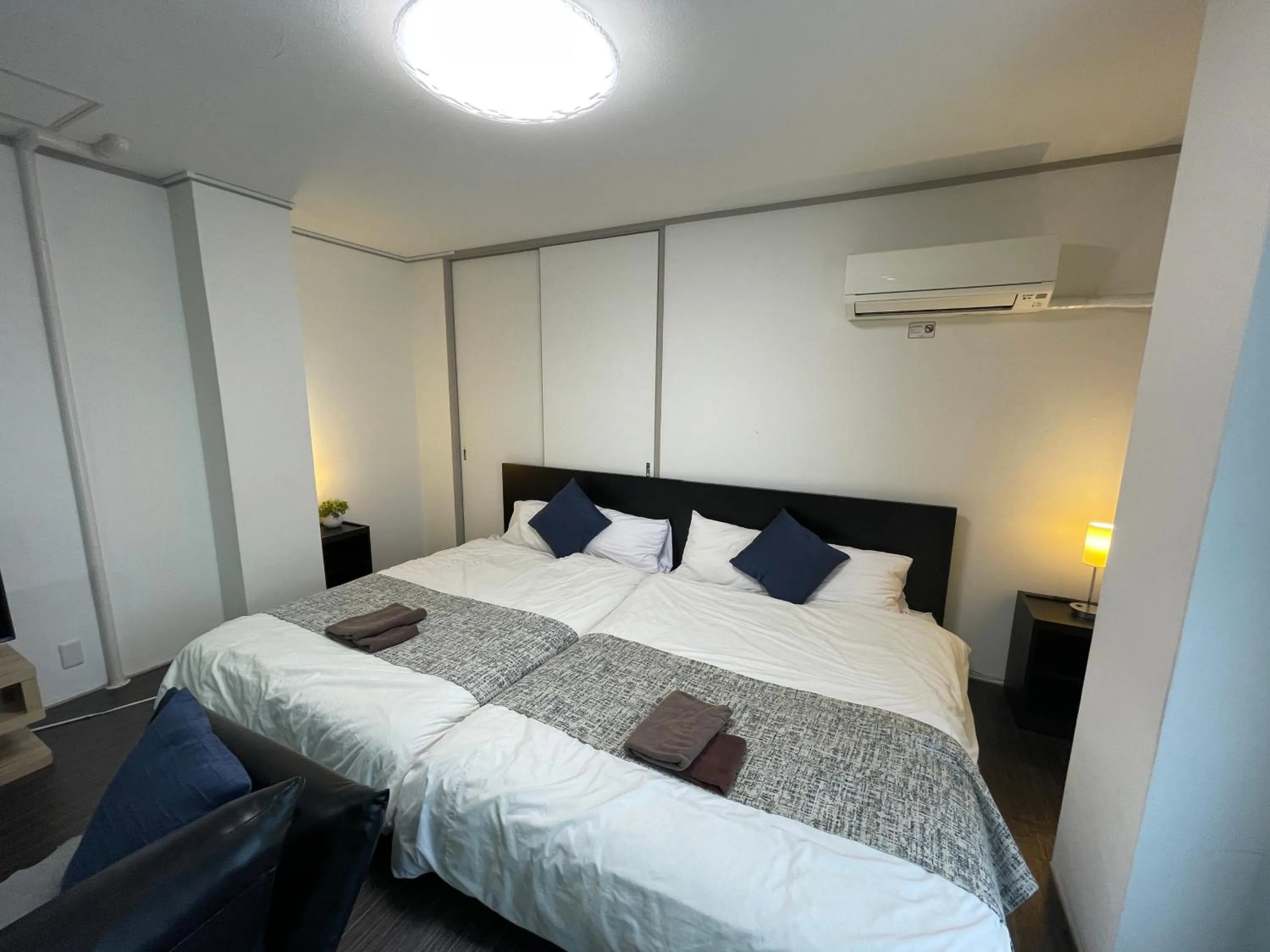 Bed in Fuji Heights Hotel