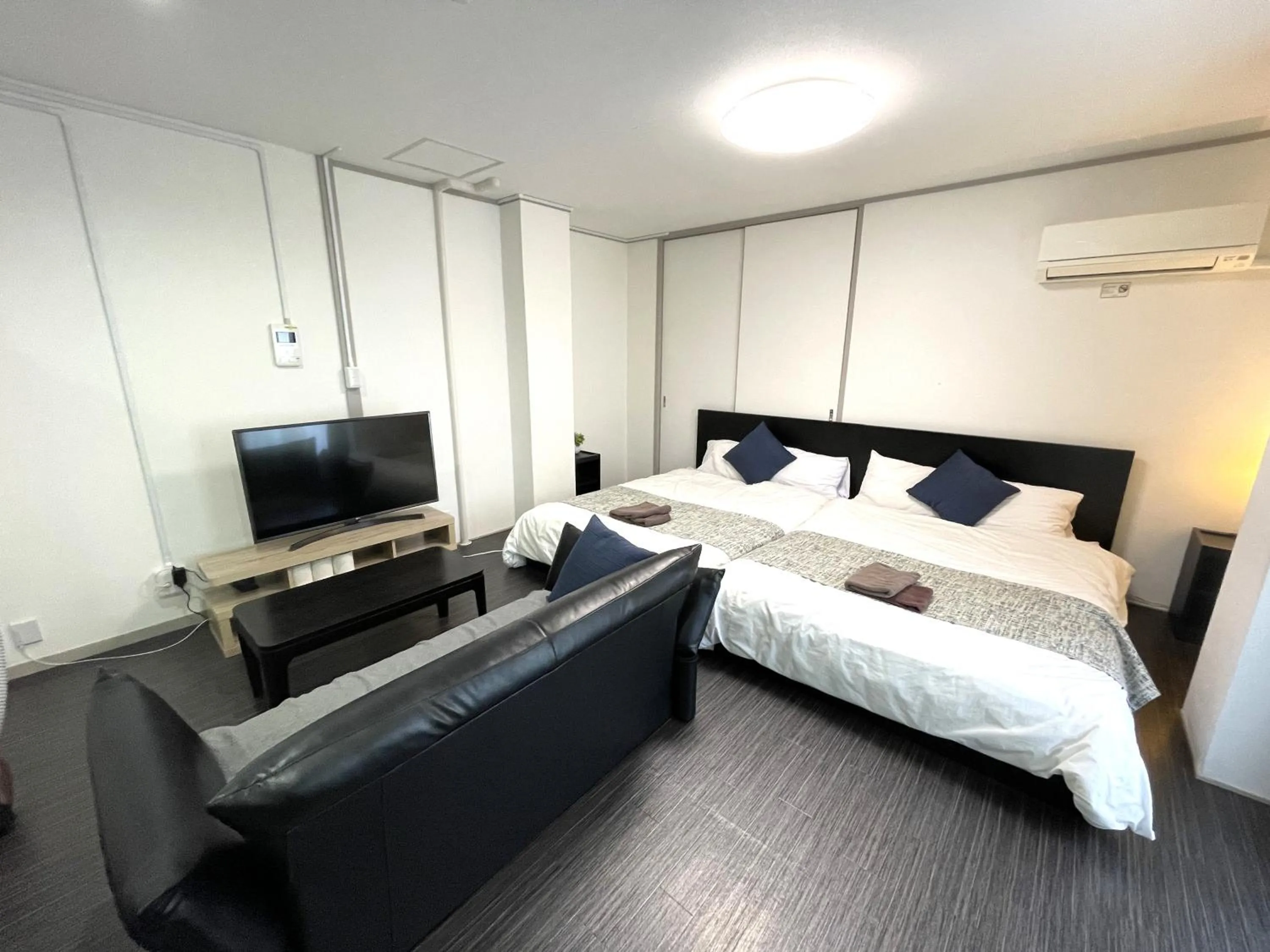 Bed in Fuji Heights Hotel