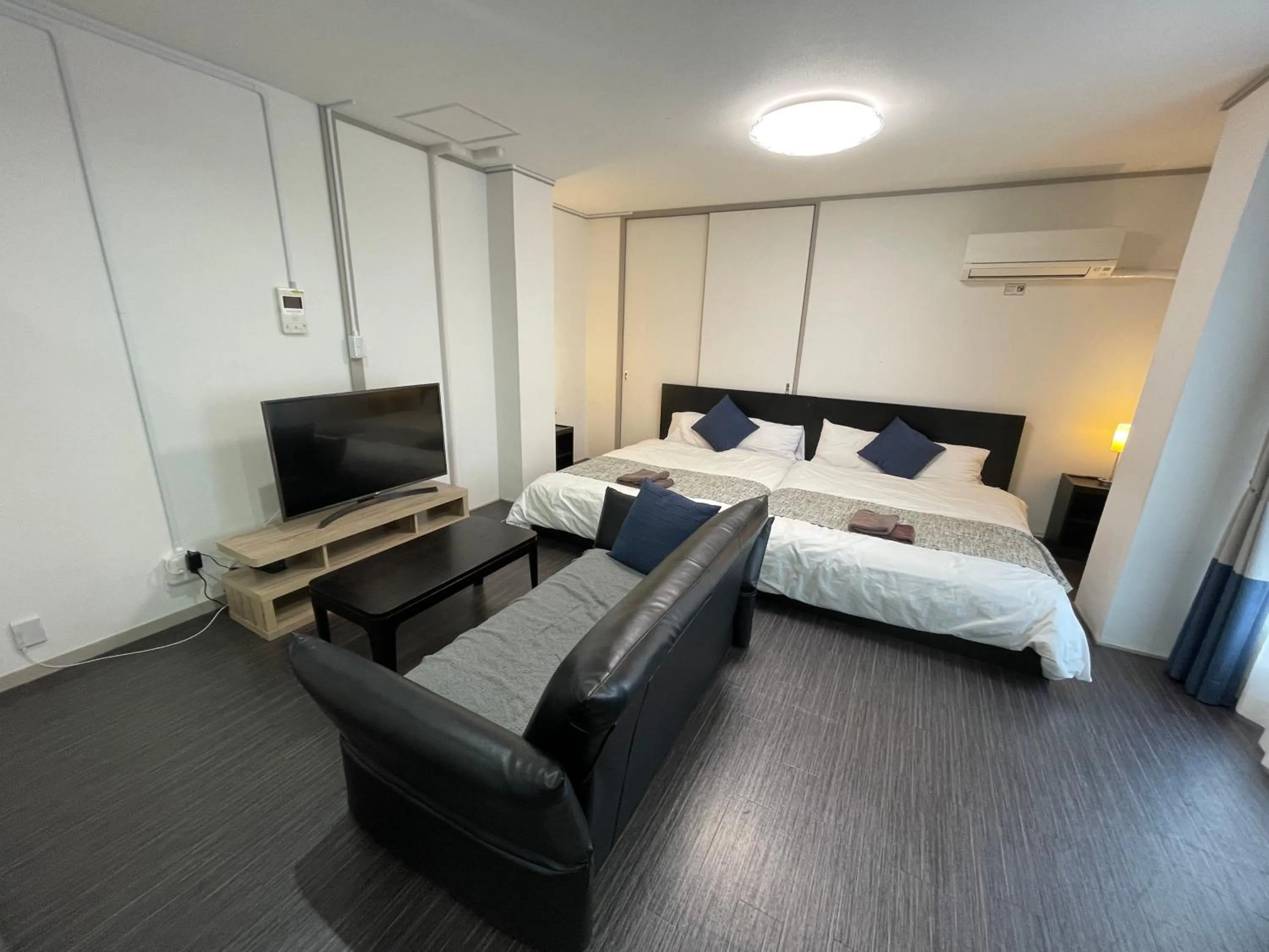 Bed in Fuji Heights Hotel