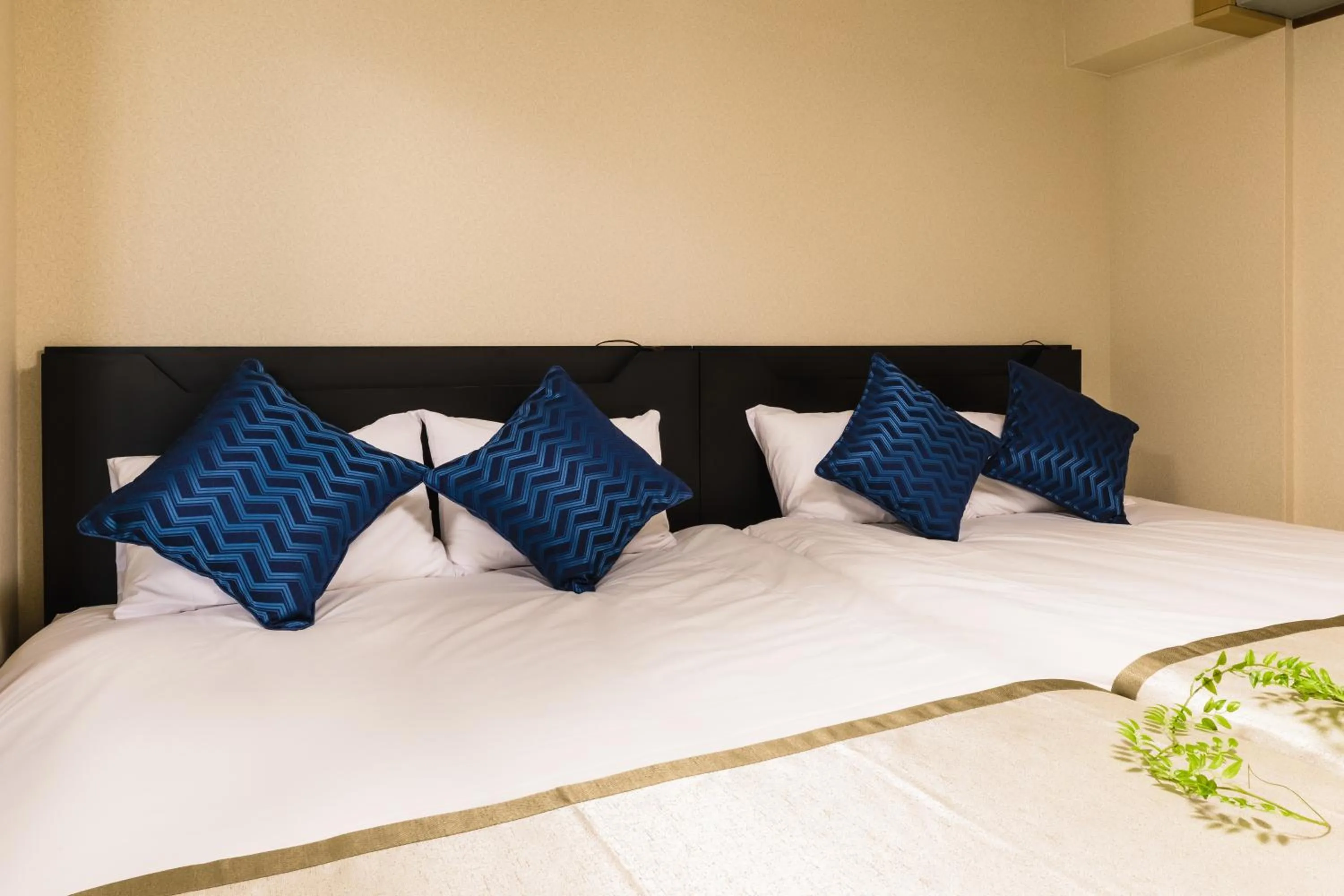 Bed in Fuji Heights Hotel