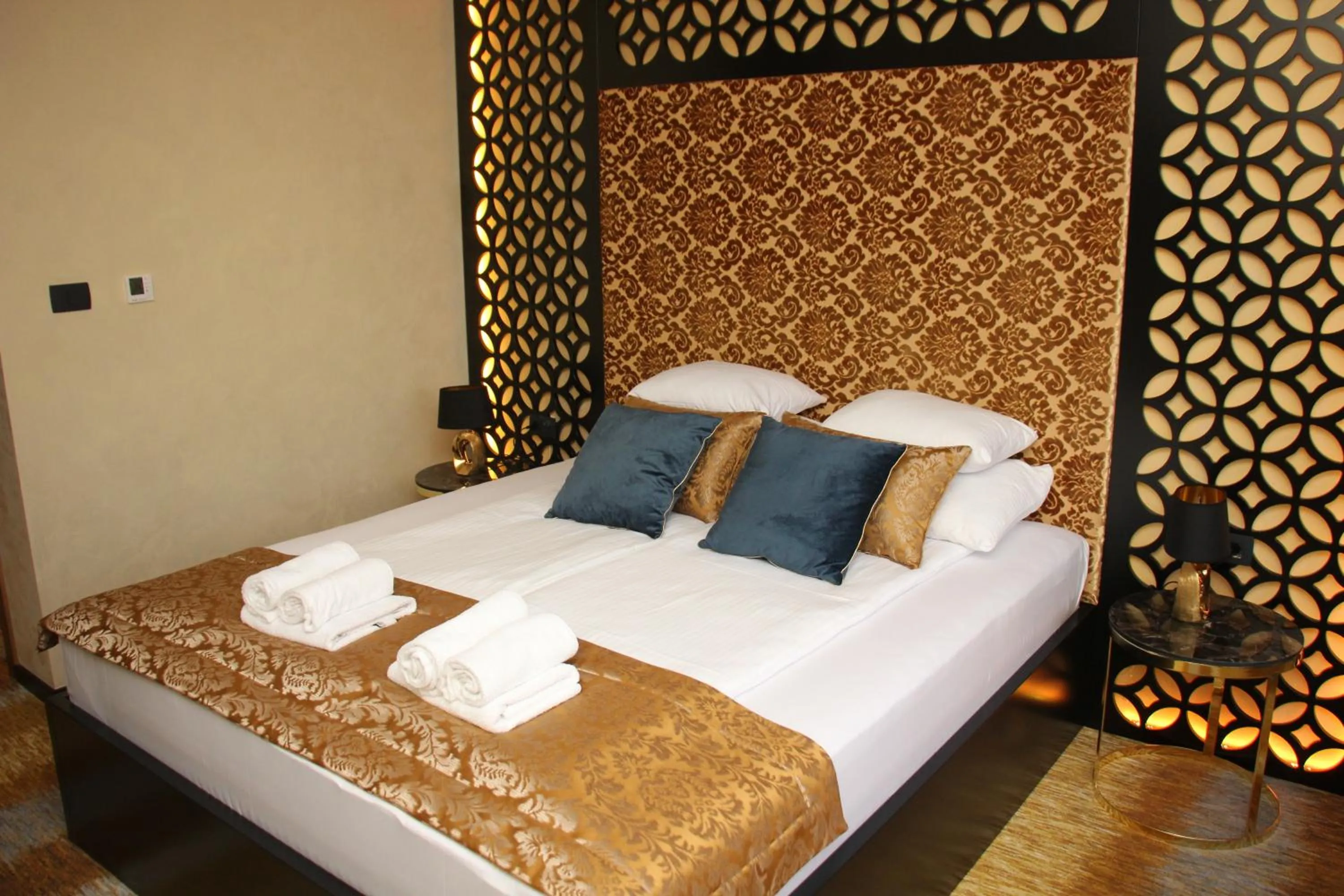 Bed in Carpe Diem Boutique Hotel