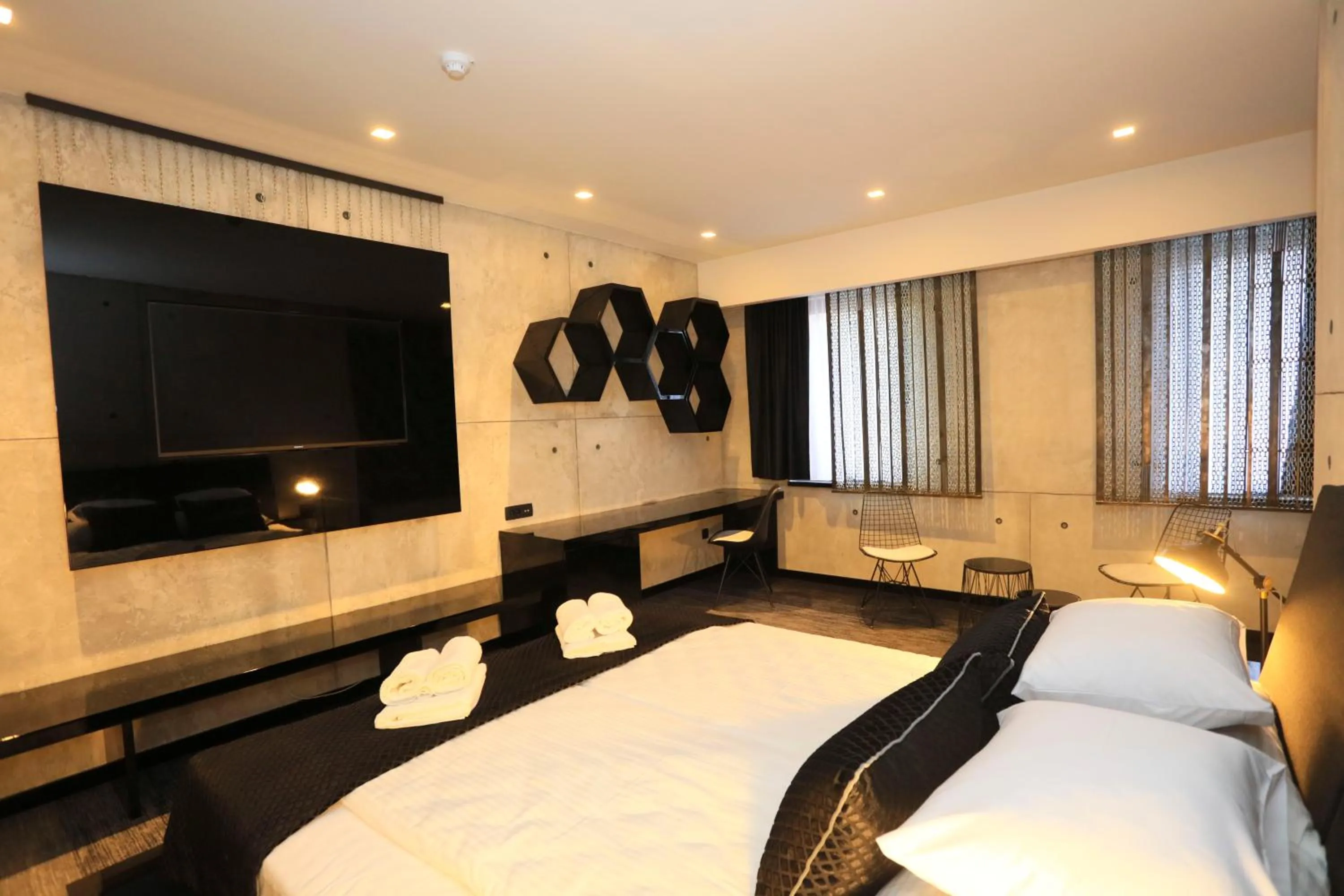 Bed in Carpe Diem Boutique Hotel