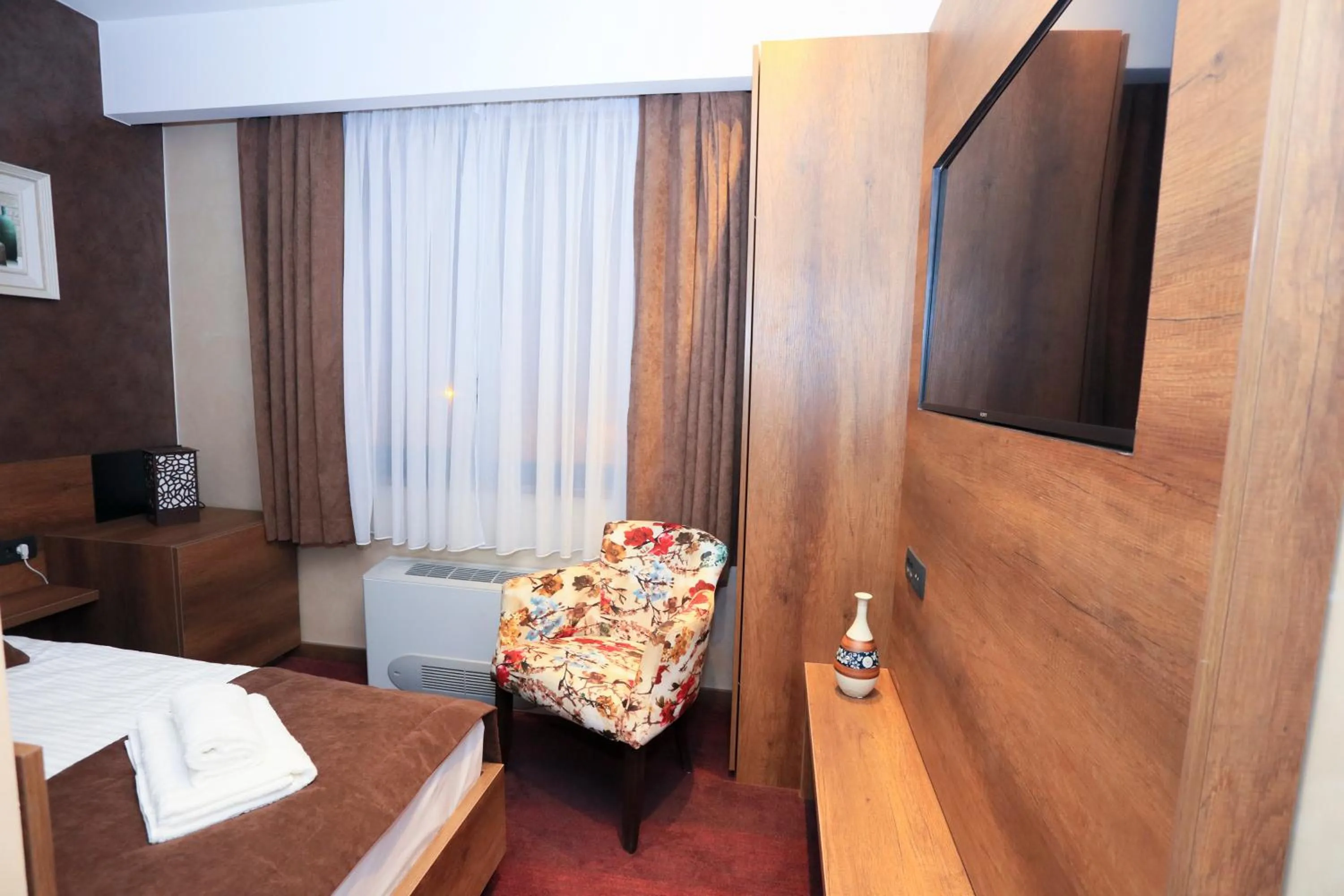 Bed in Carpe Diem Boutique Hotel