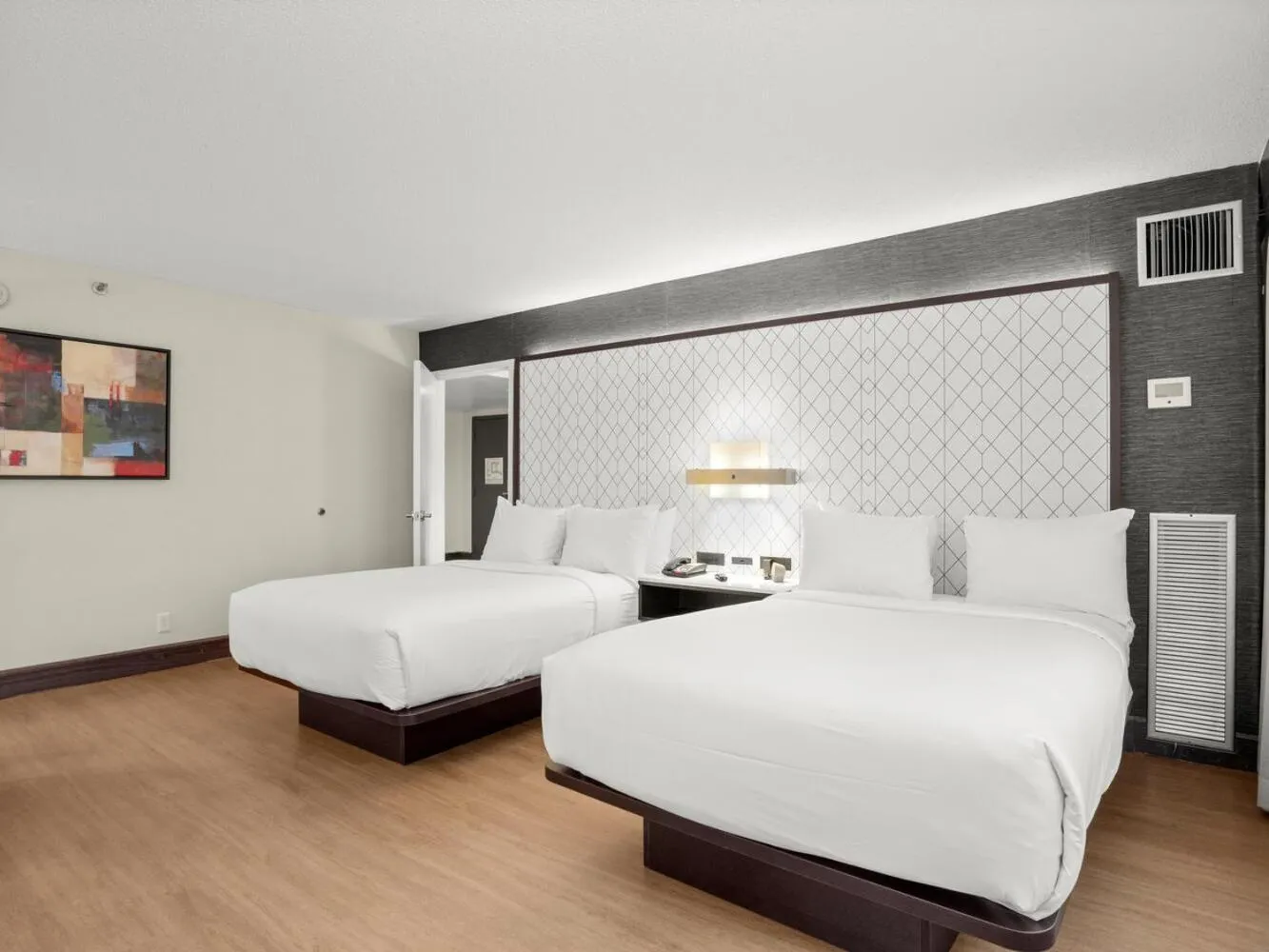 Bed in The Armon Stamford Hotel & Conference Center